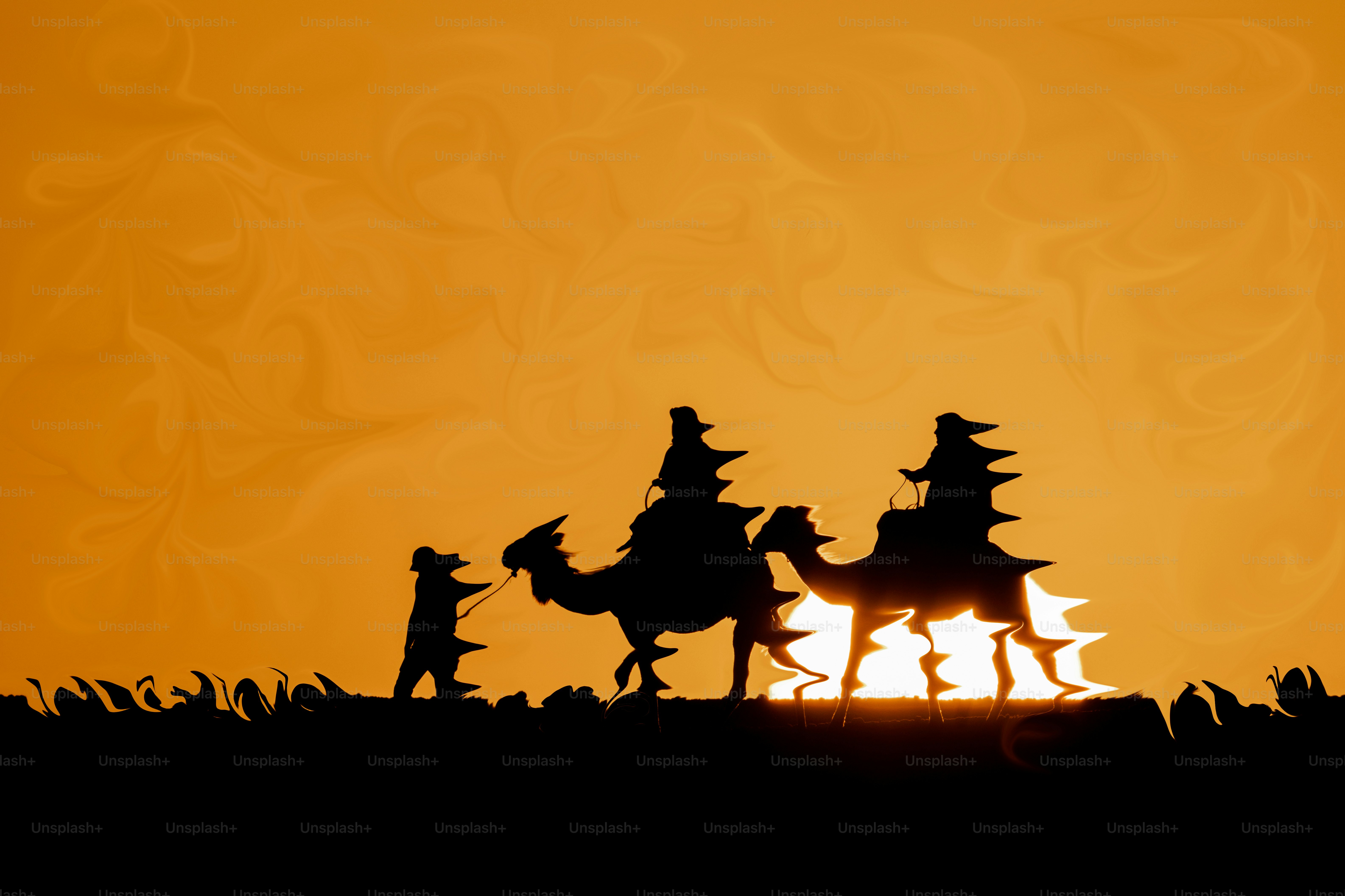 Three figures on camels silhouetted against an orange sky.