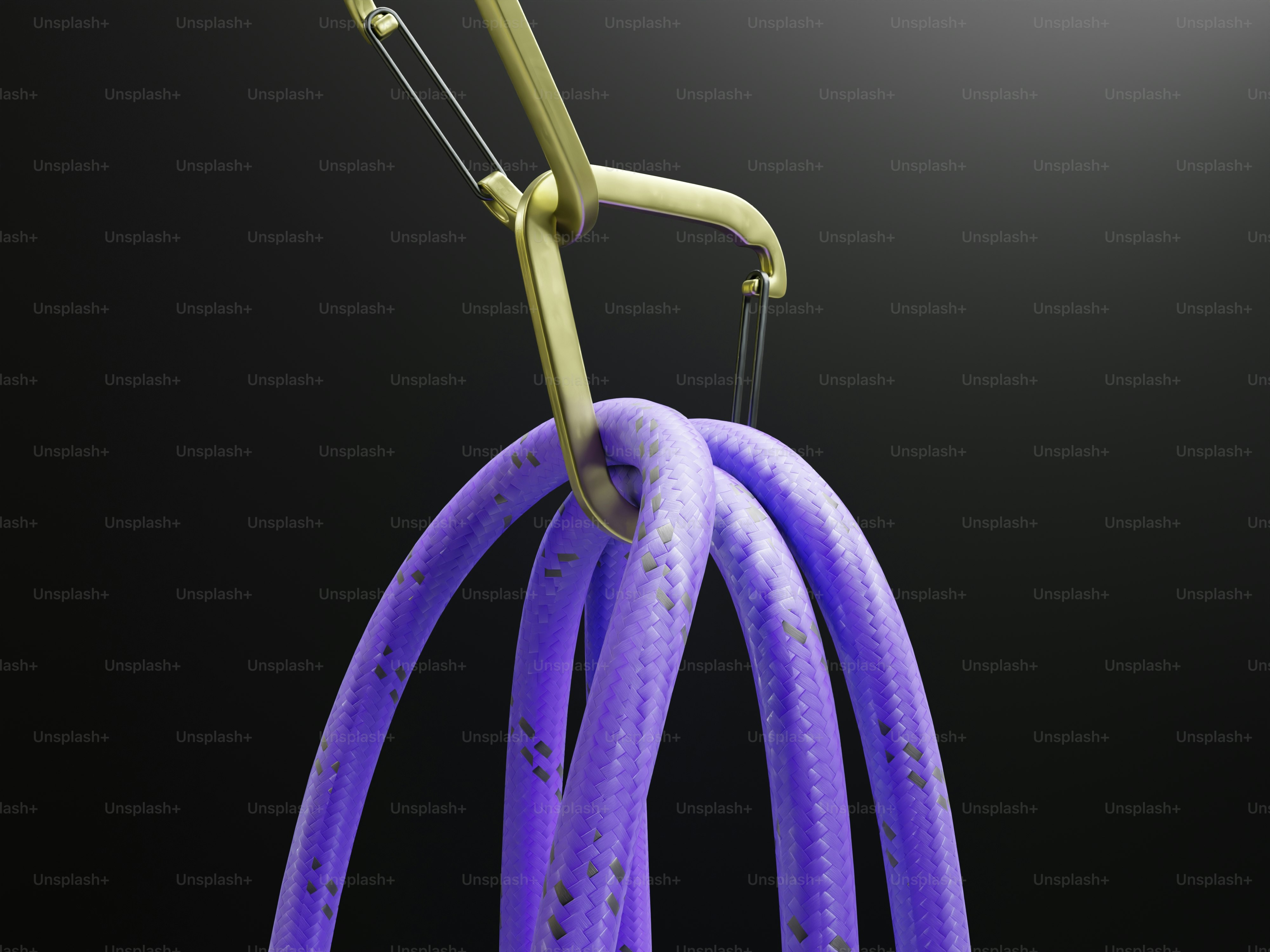A hook lifts a bundle of purple cables.