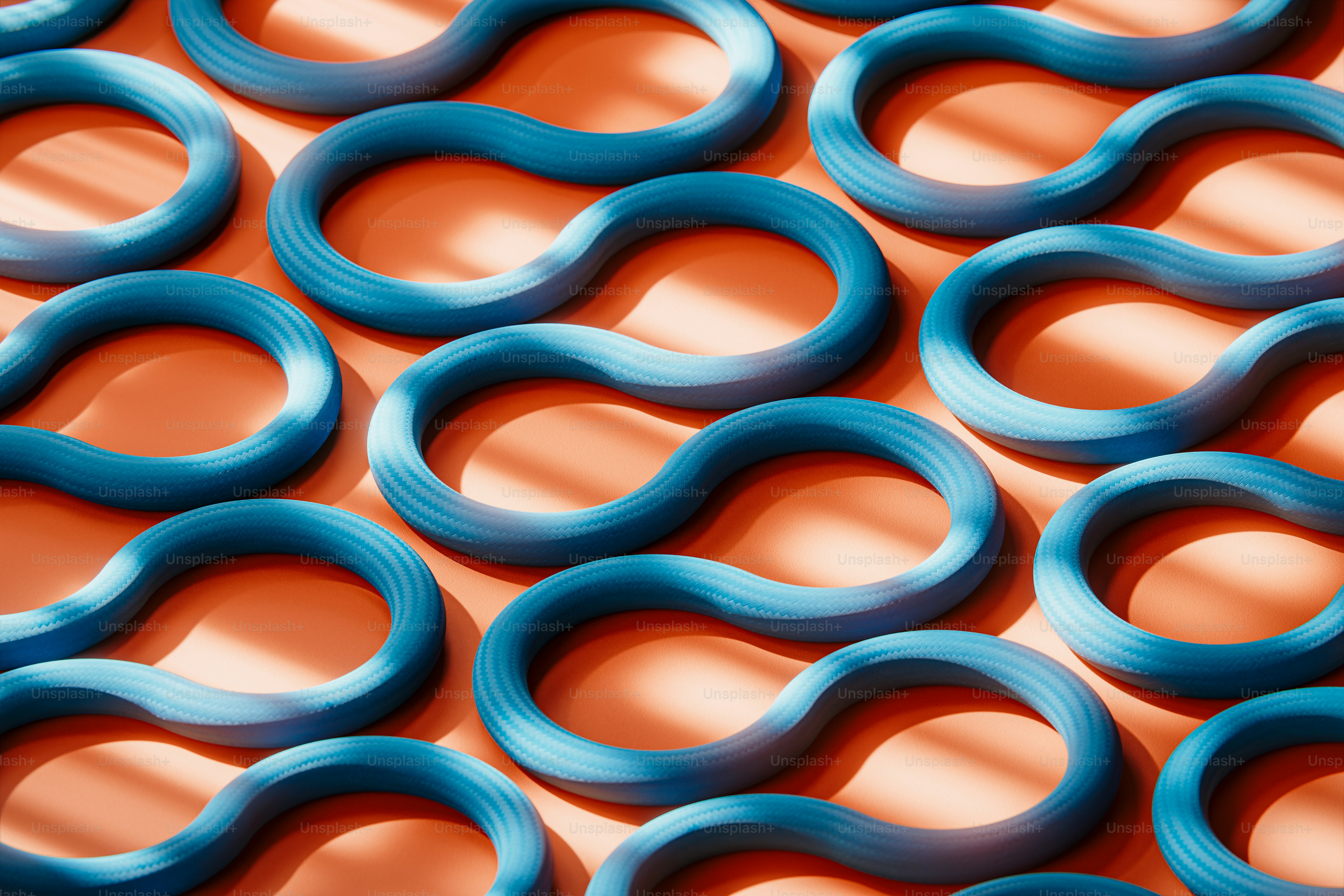 Blue infinity symbols arranged in a pattern. photo – Abstract Image on ...