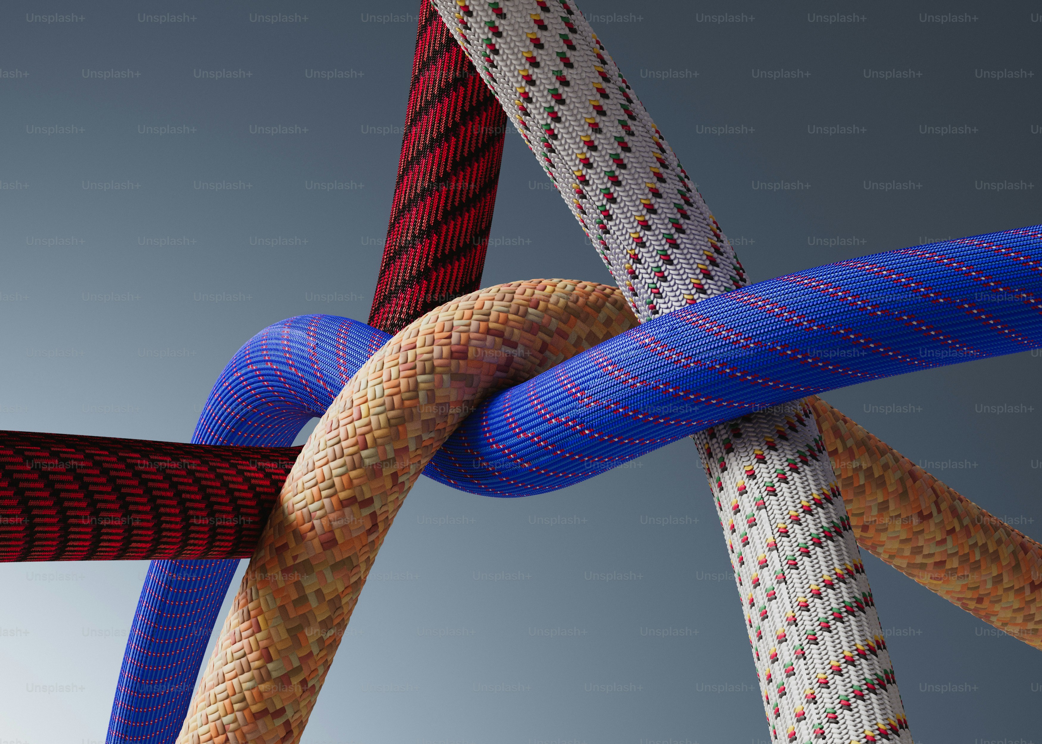 A close-up of a tied knot on a rope. photo – Texture Image on Unsplash