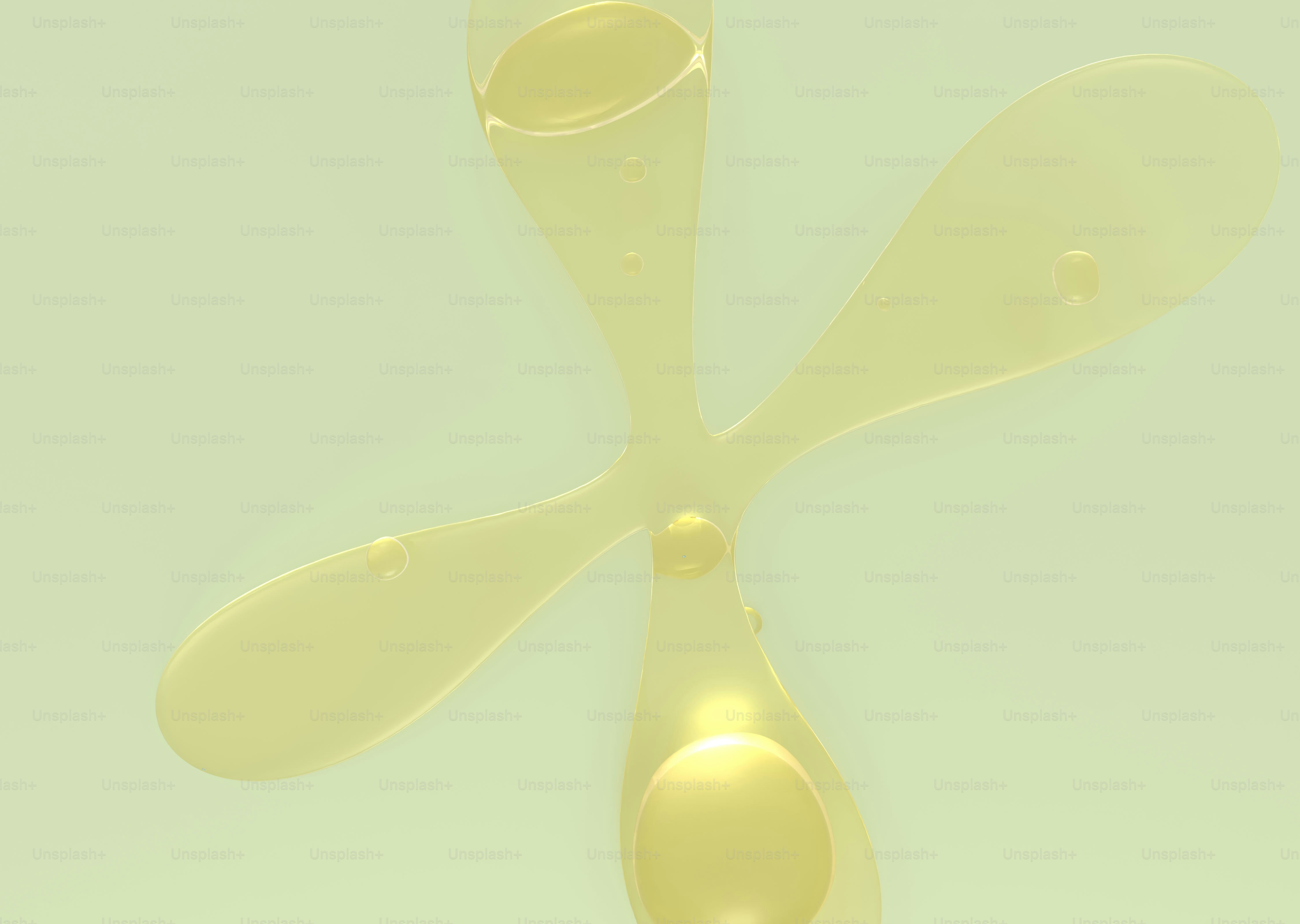 Abstract yellow liquid forming a cross shape