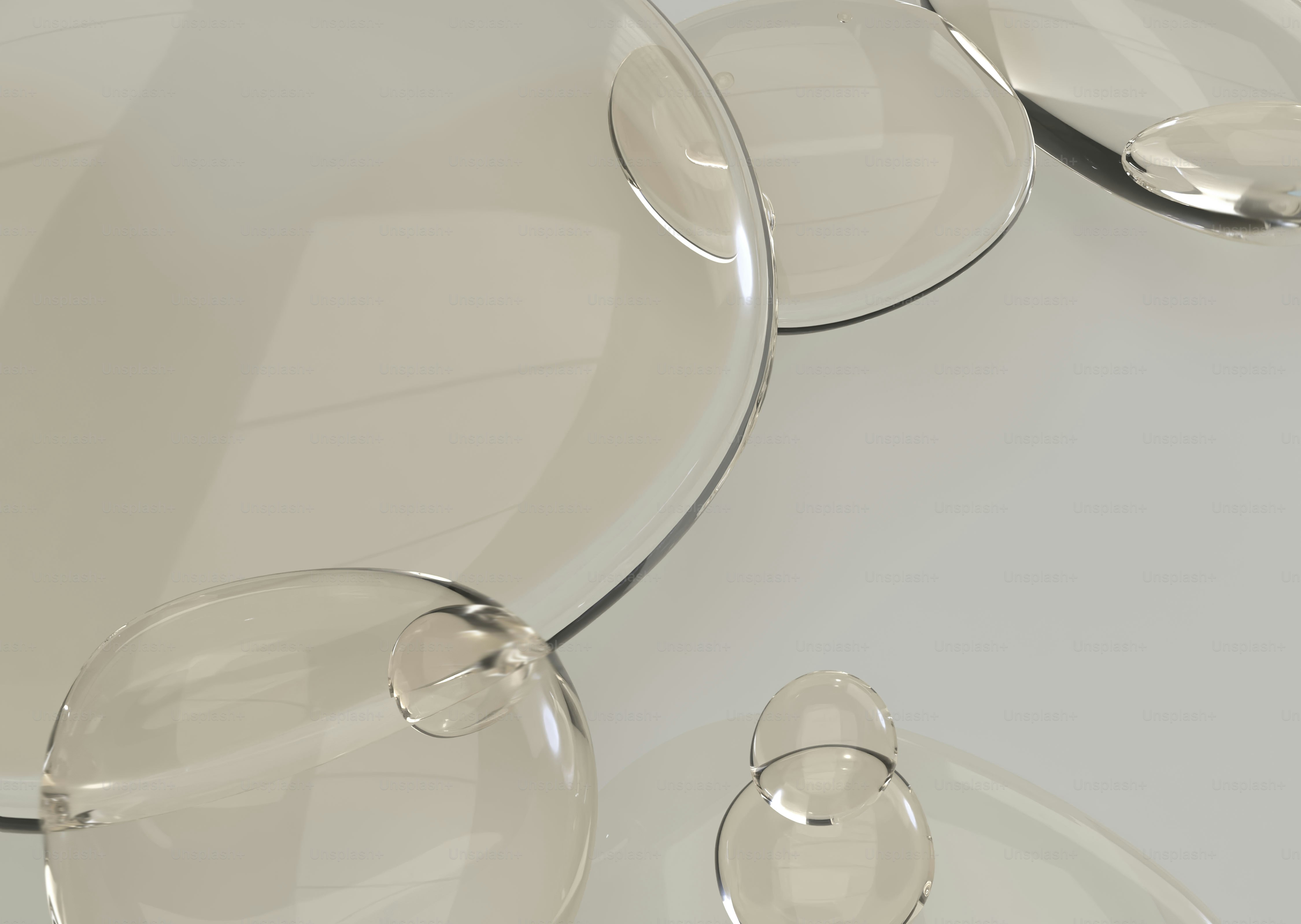 Clear bubbles on a light gray surface