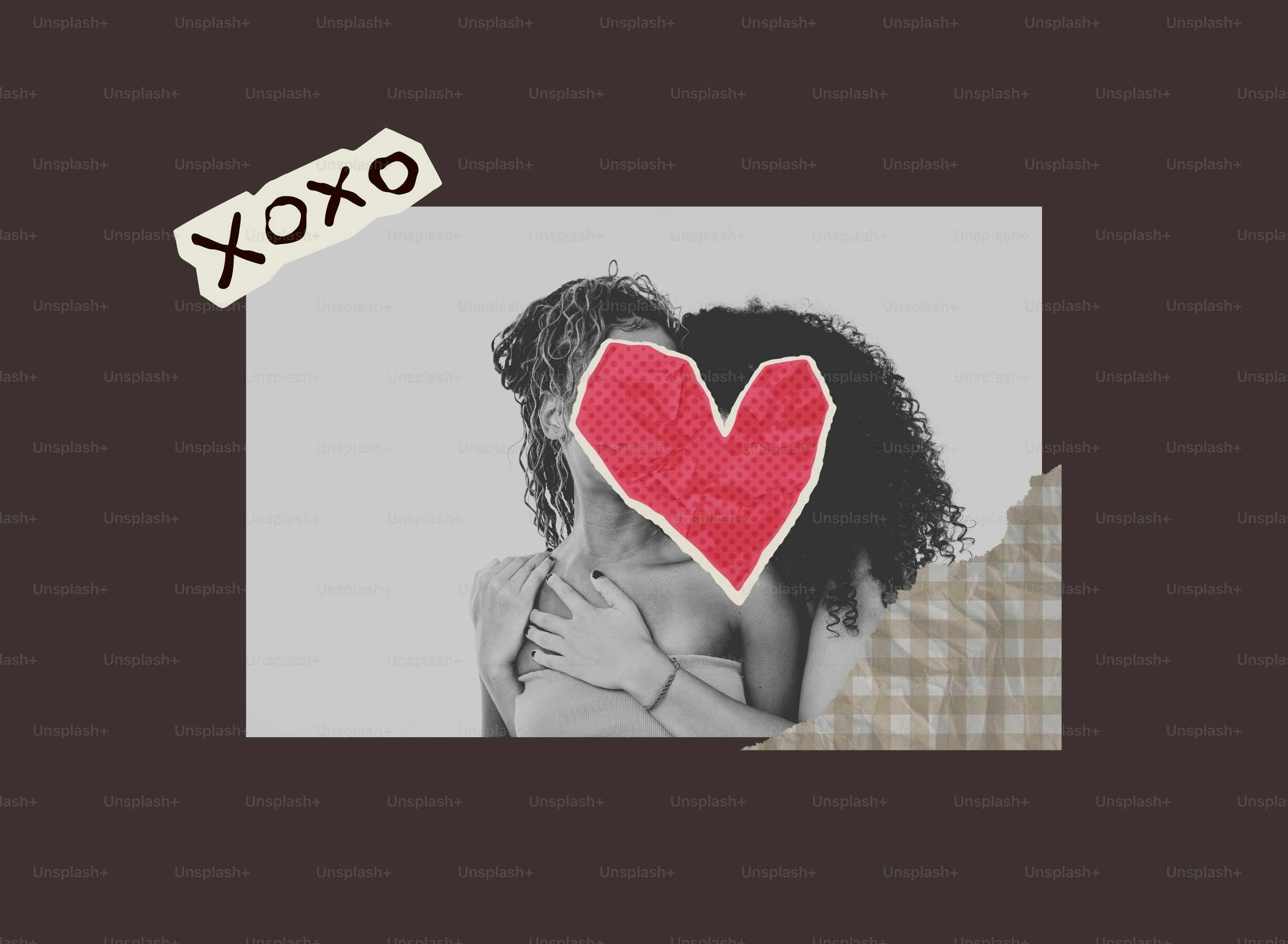 Two people embracing with a red heart covering faces