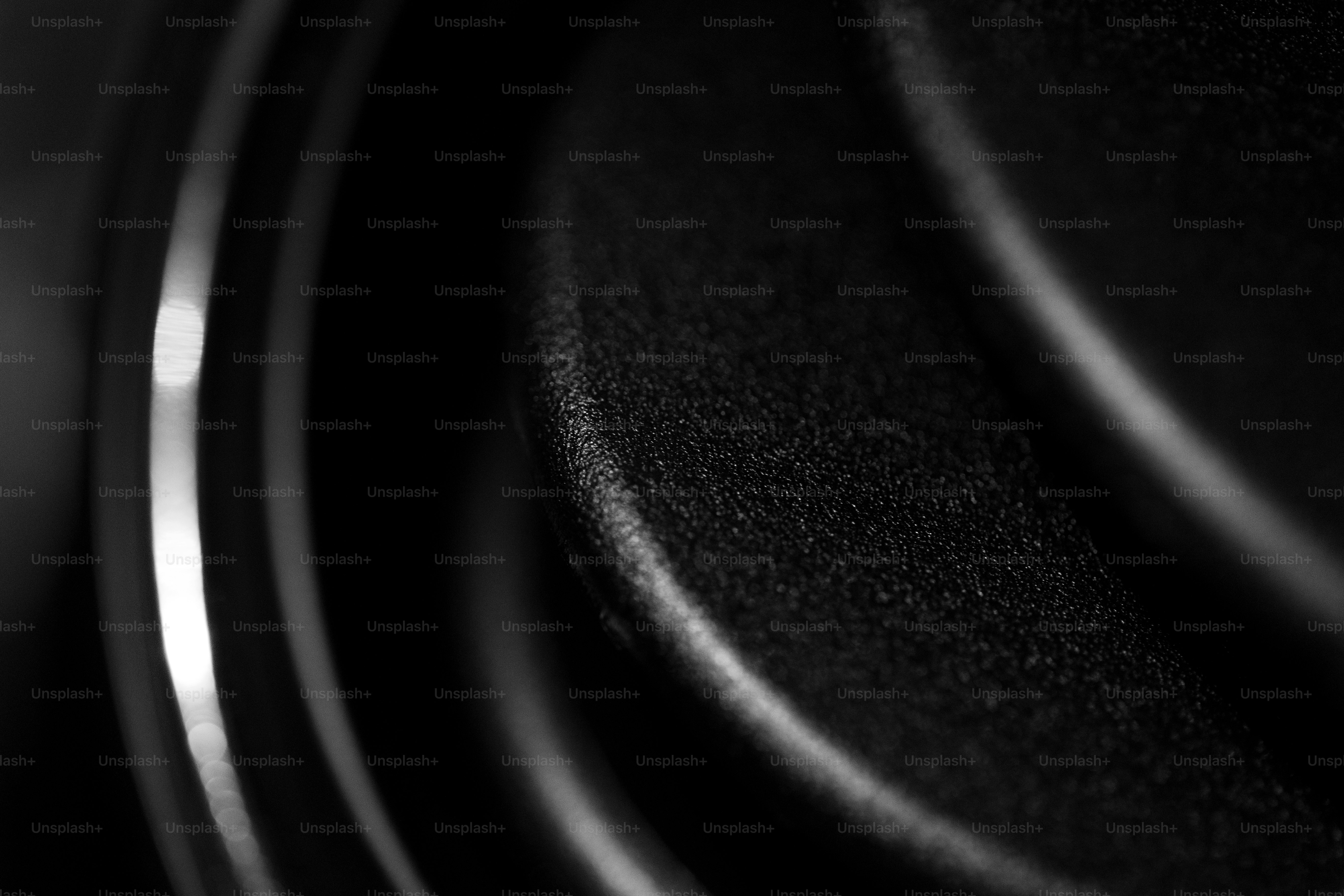 Close-up abstract view of textured black speaker cone