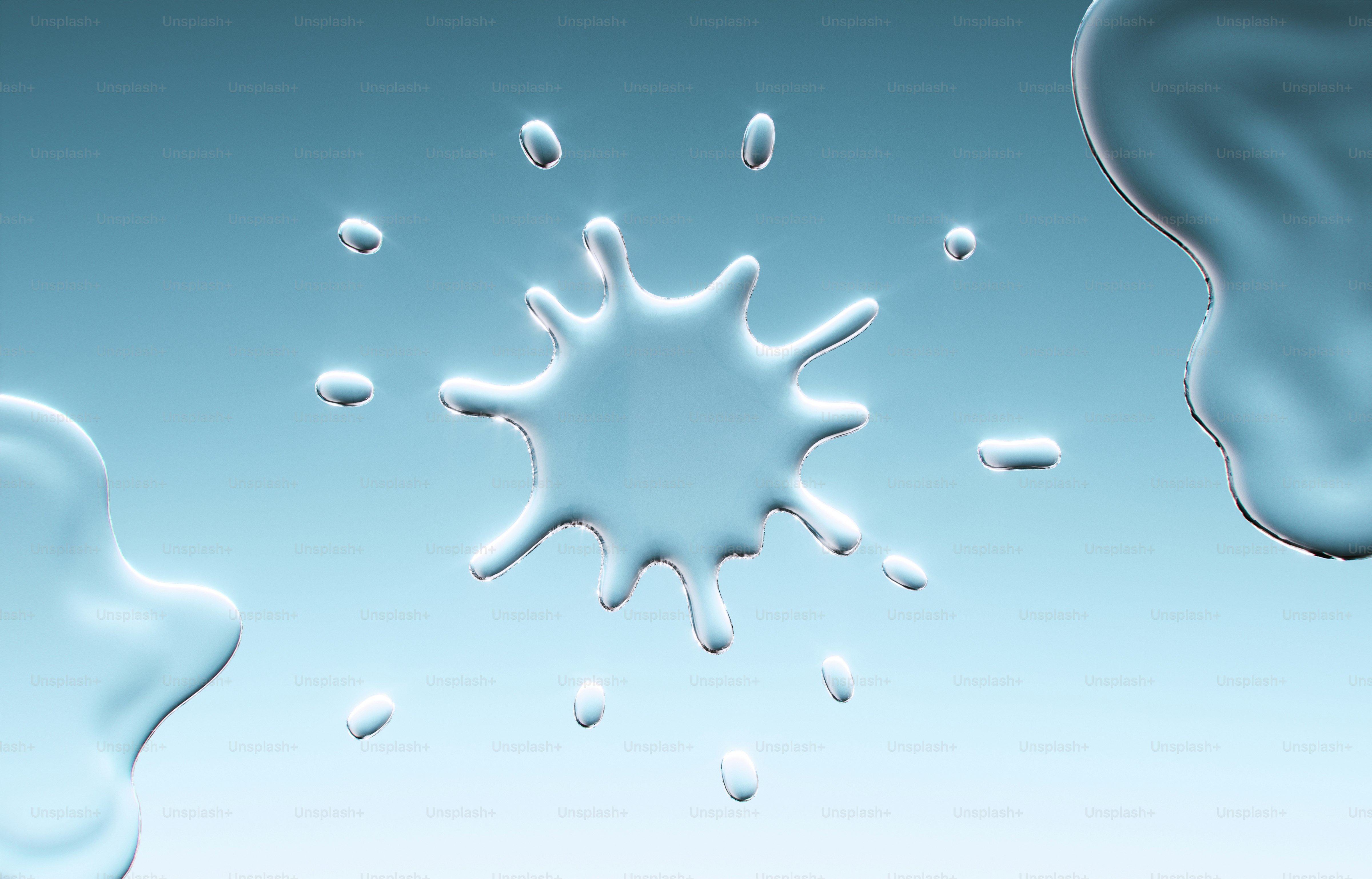 A clear water splash against a blue background. photo – Background ...