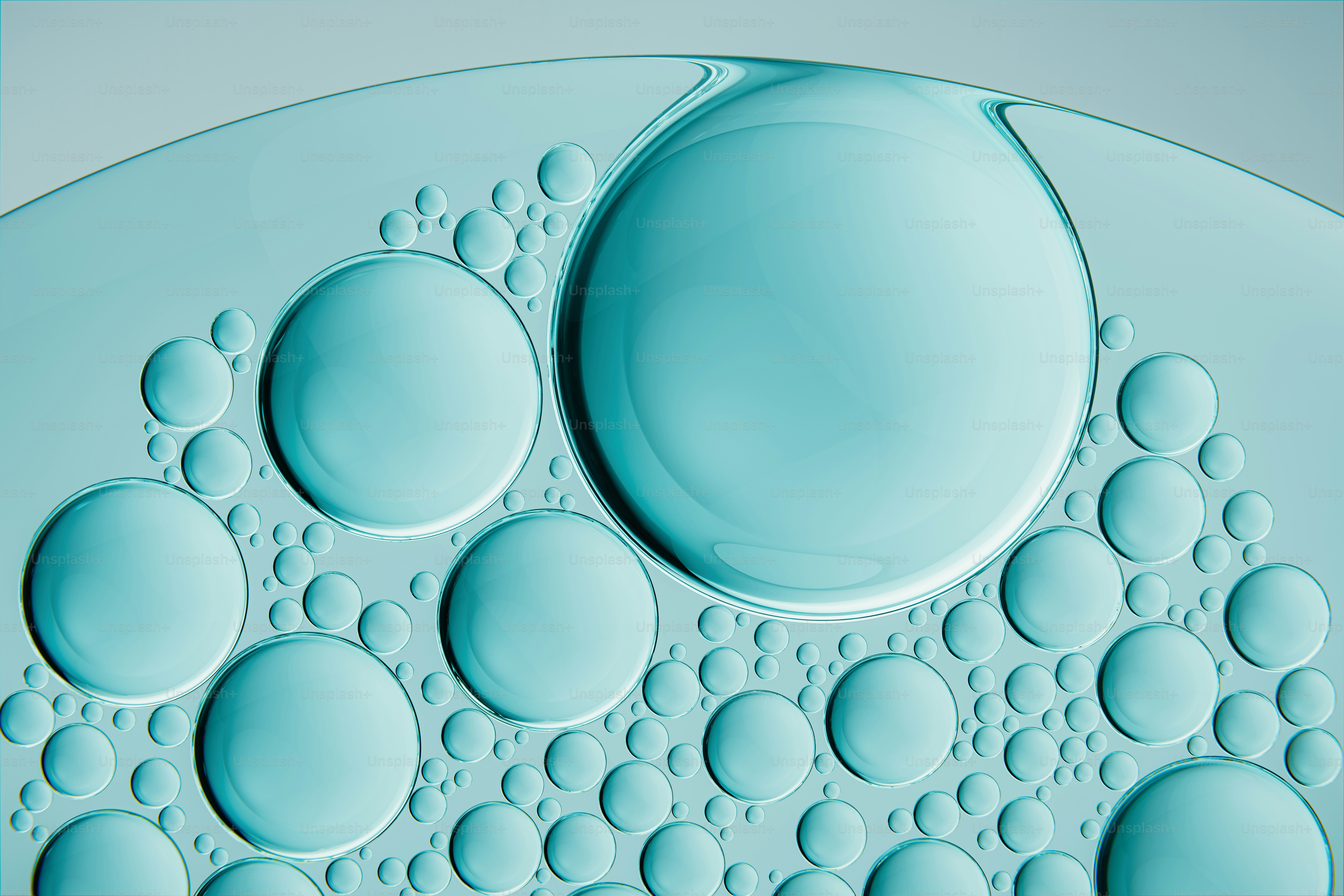 Close-up of turquoise oil bubbles on a light background