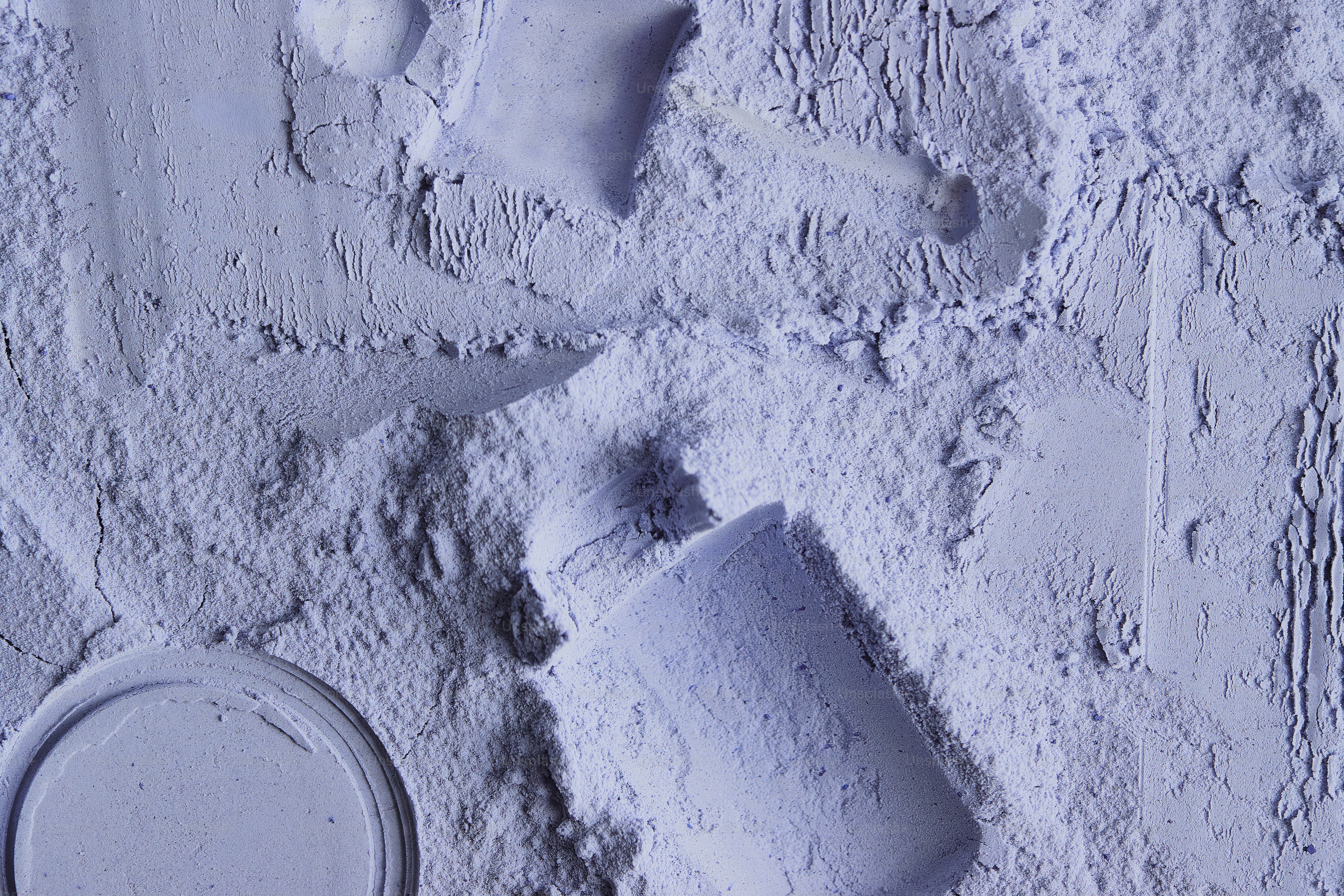A collection of pale blue cosmetic products and powder. photo ...