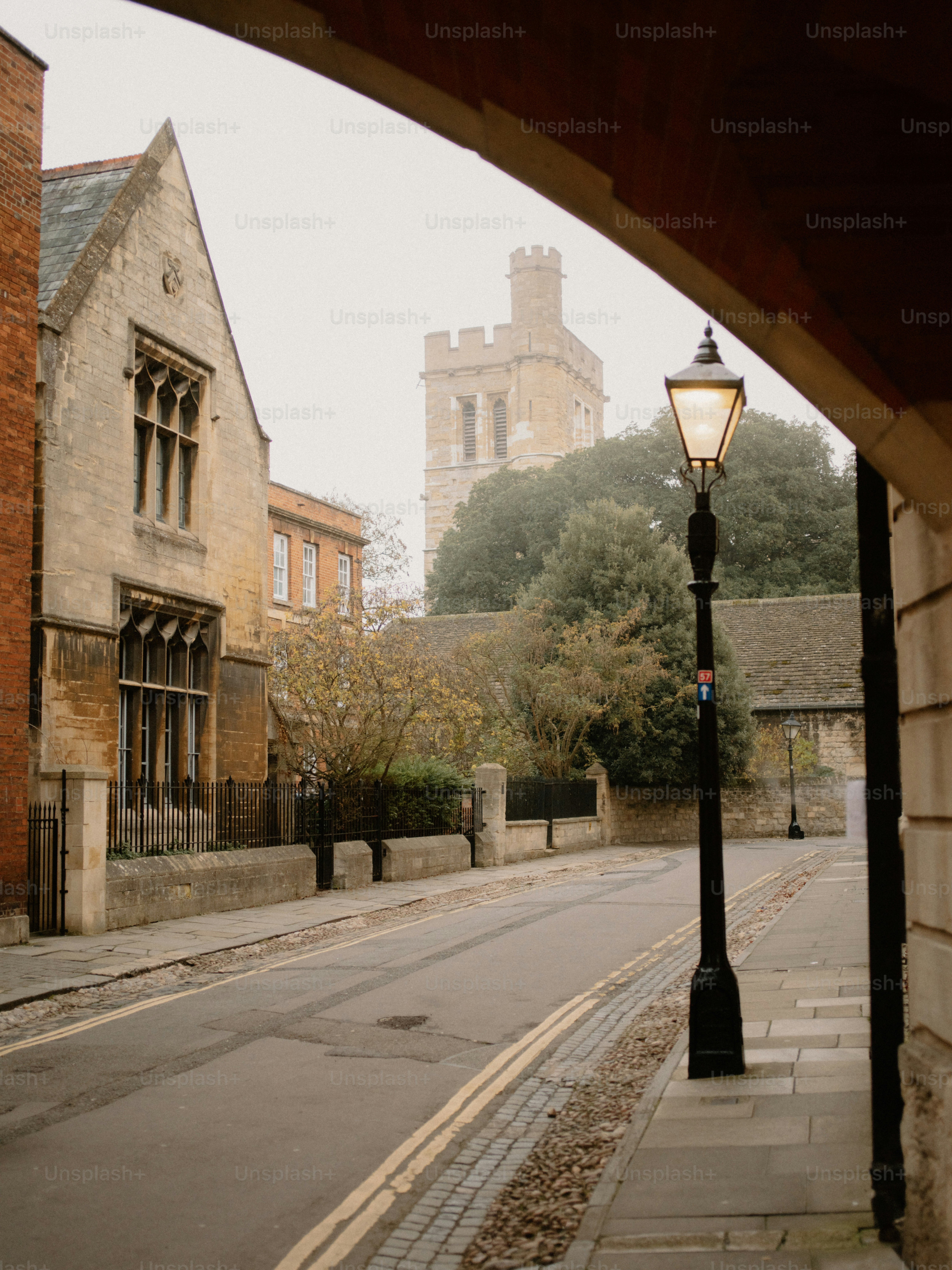 Old street with lamp post and historic building
