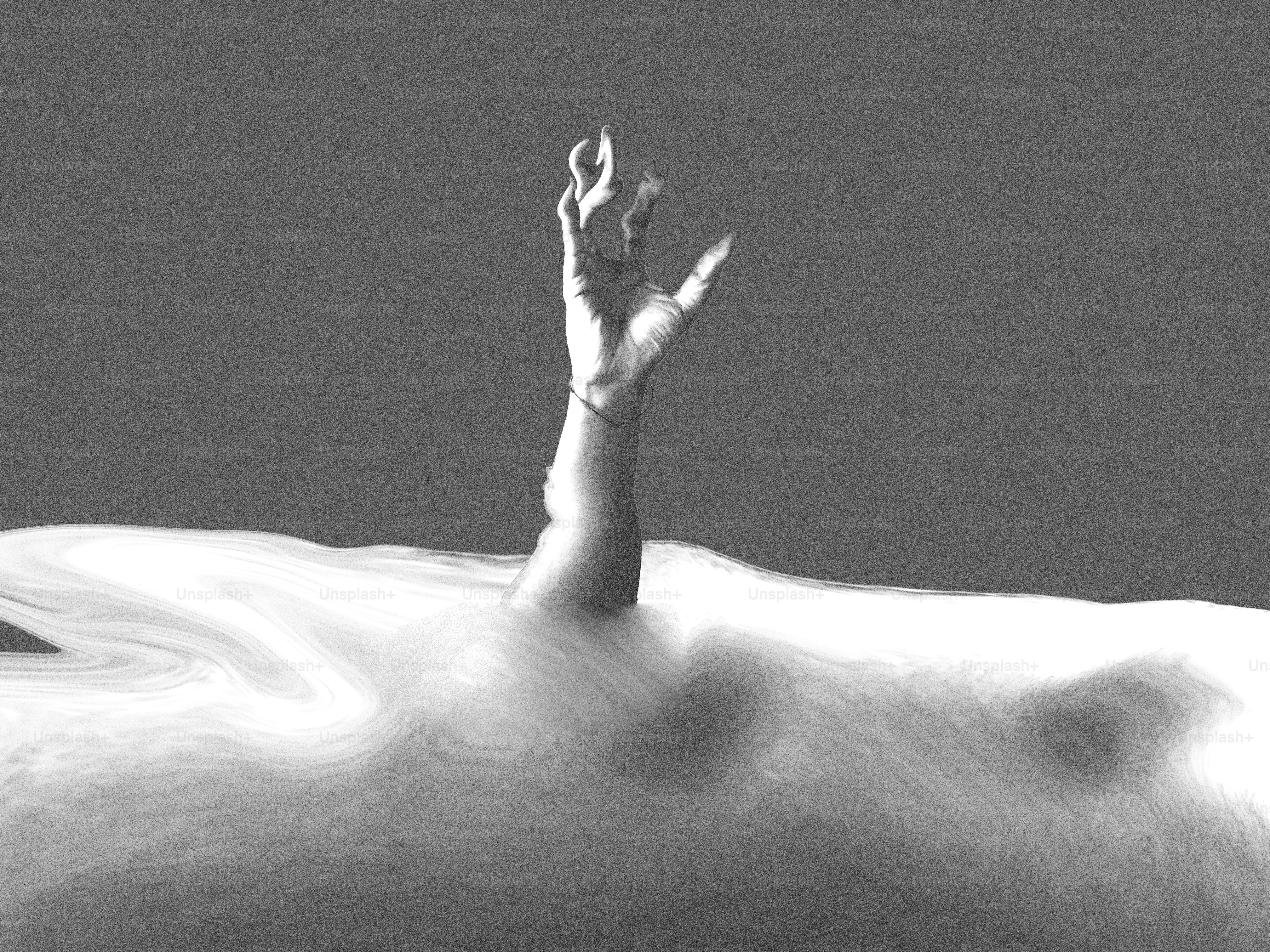 A hand emerges from a swirling, abstract white mass.