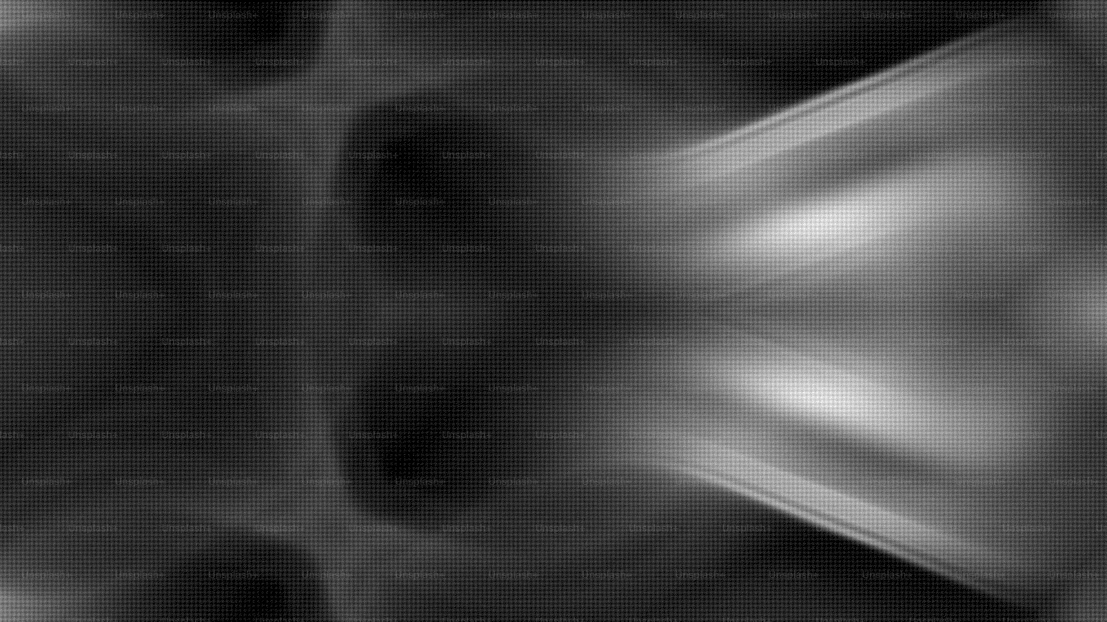 Padrões abstratos de redemoinho em tons de cinza com destaques claros