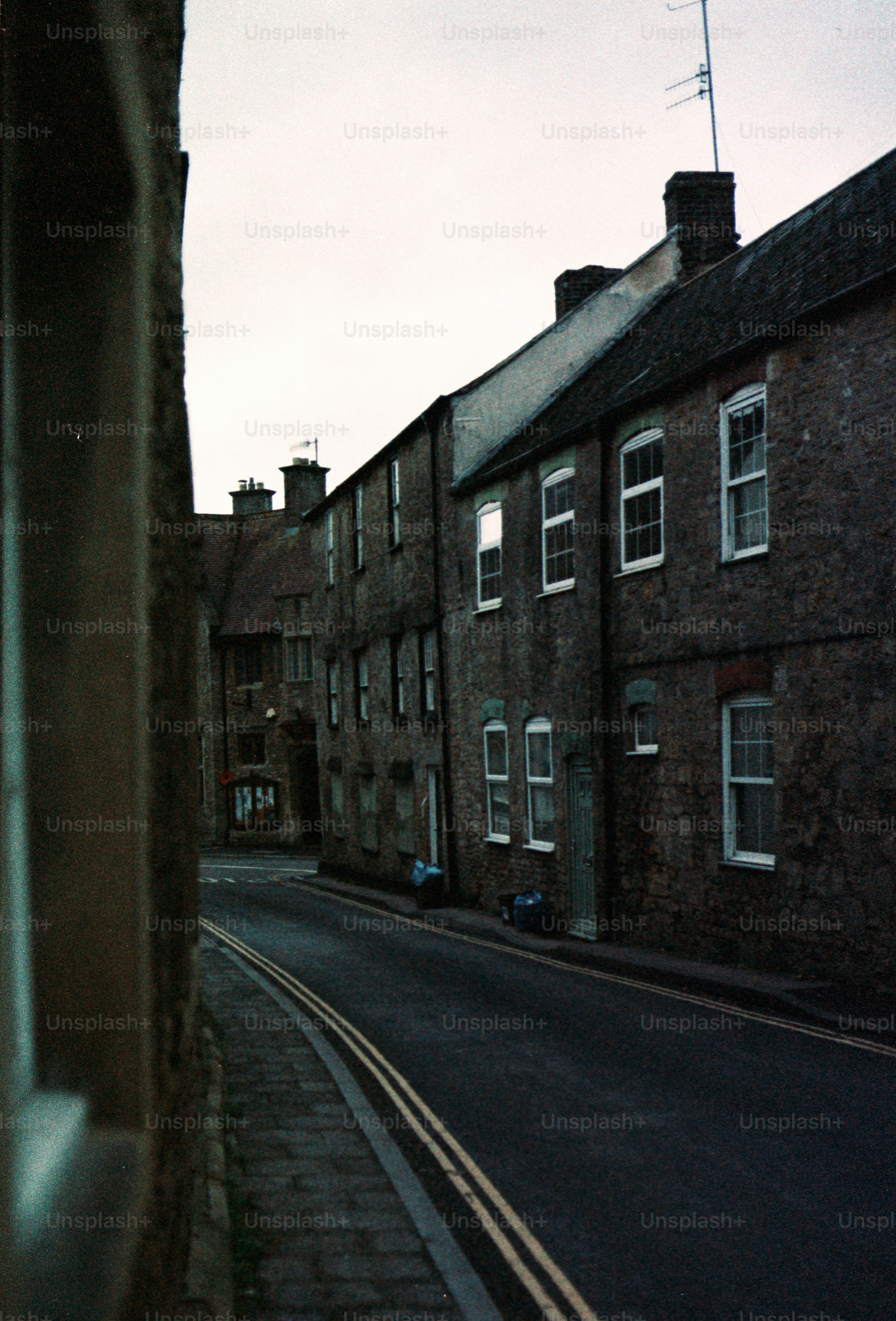 A quiet street lined with brick buildings.