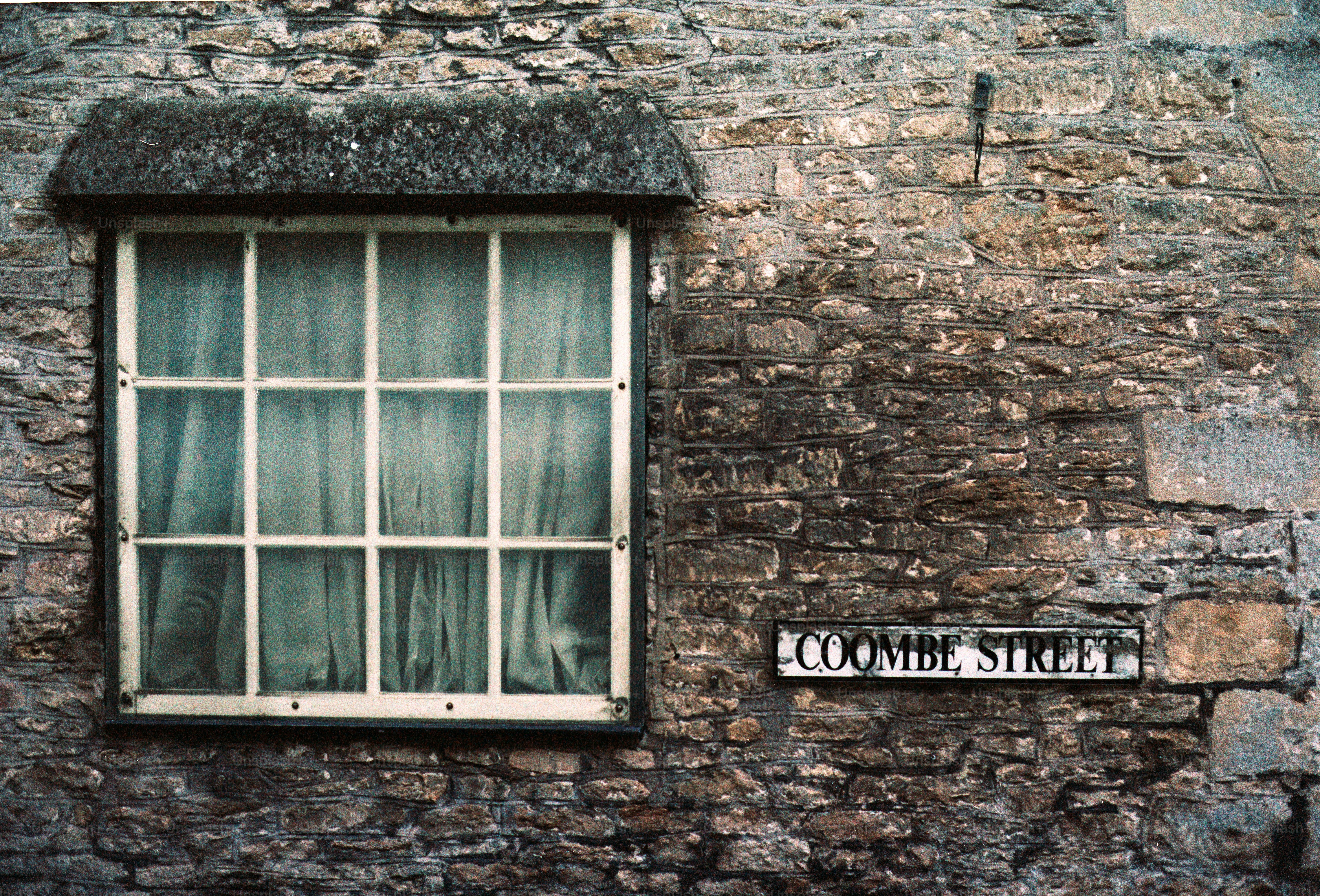 White brick house with tiled roof and windows. photo – Texture Image on ...