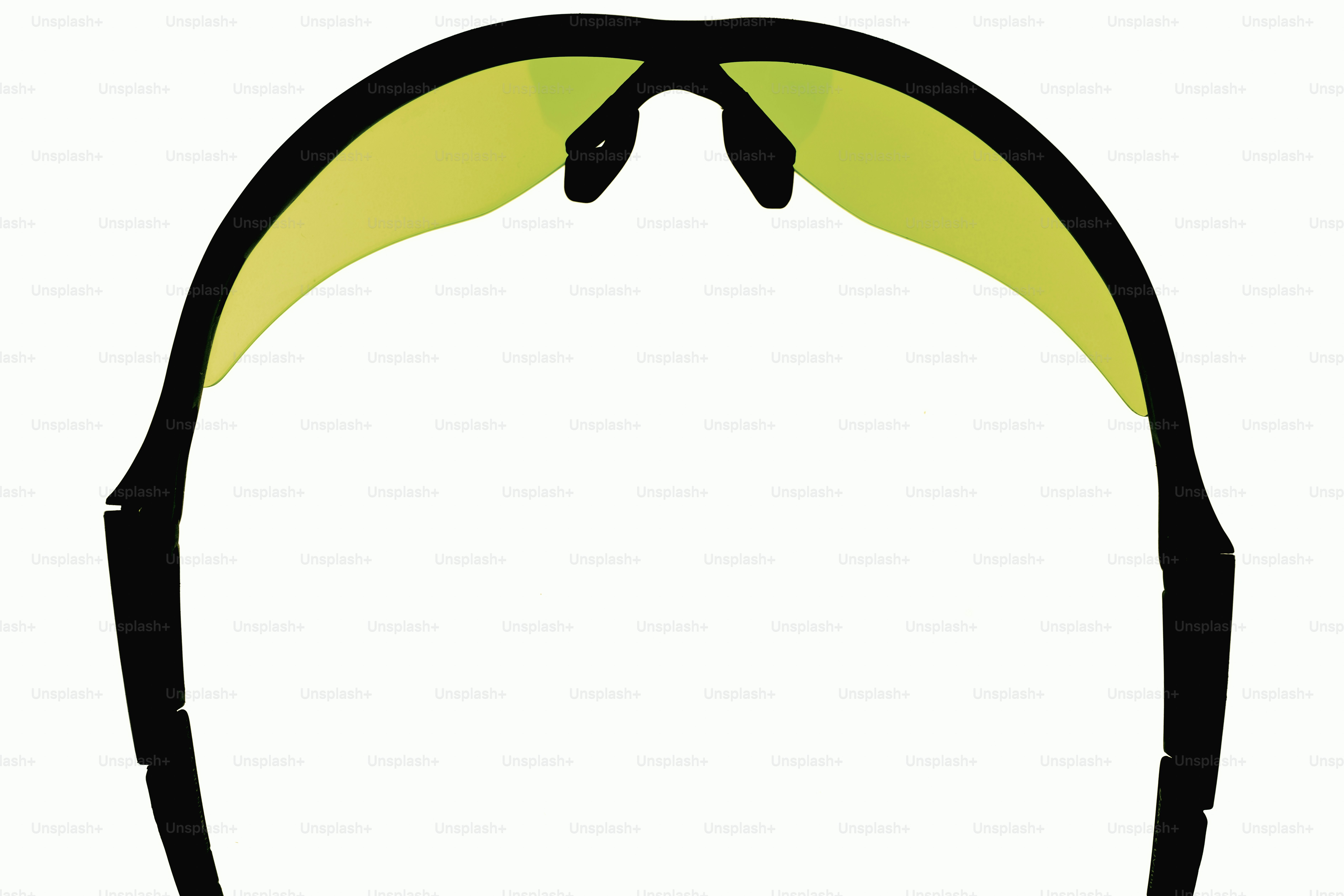 Pair of yellow tinted sports sunglasses