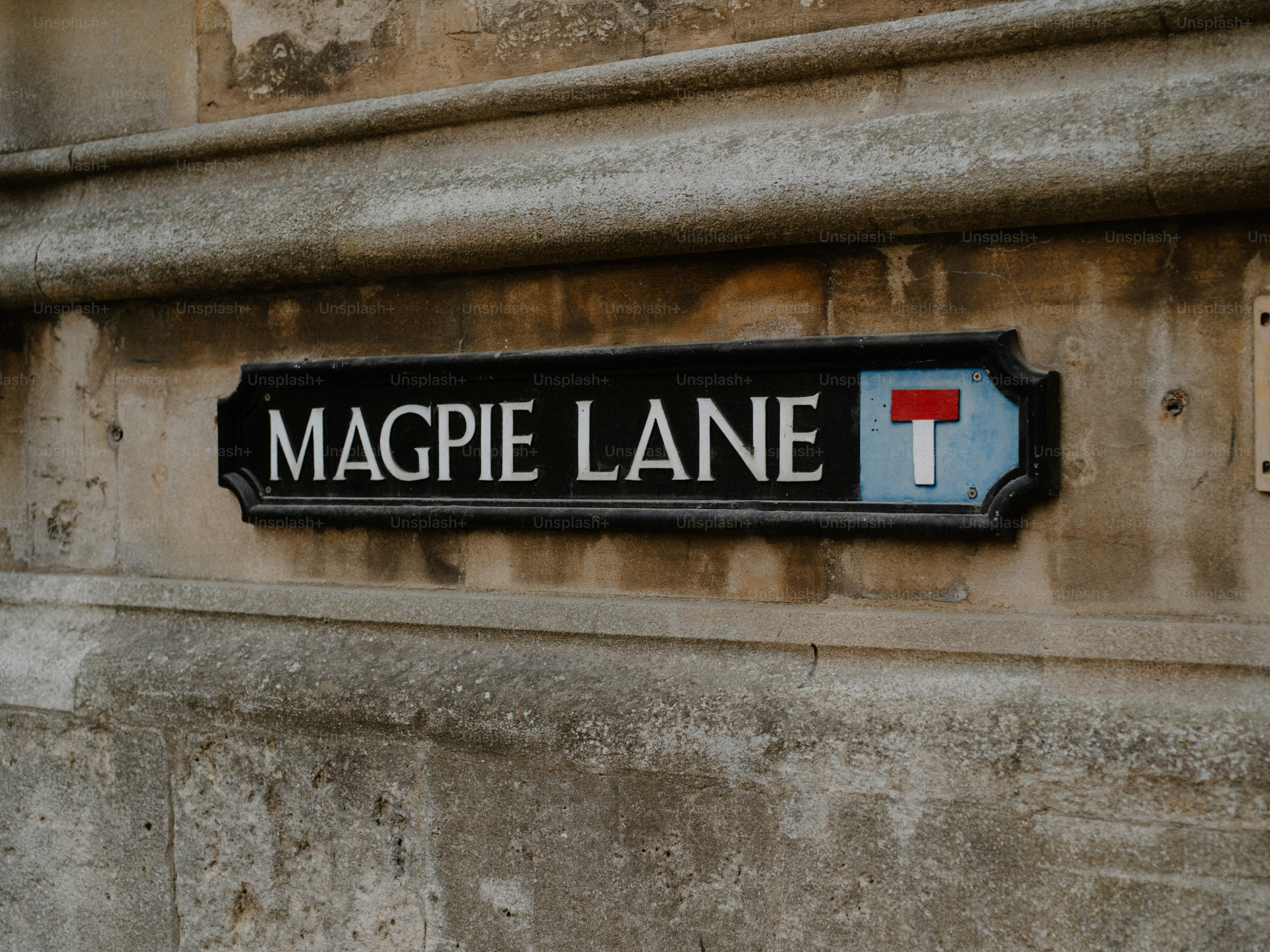 Uma placa de rua para a Magpie Lane