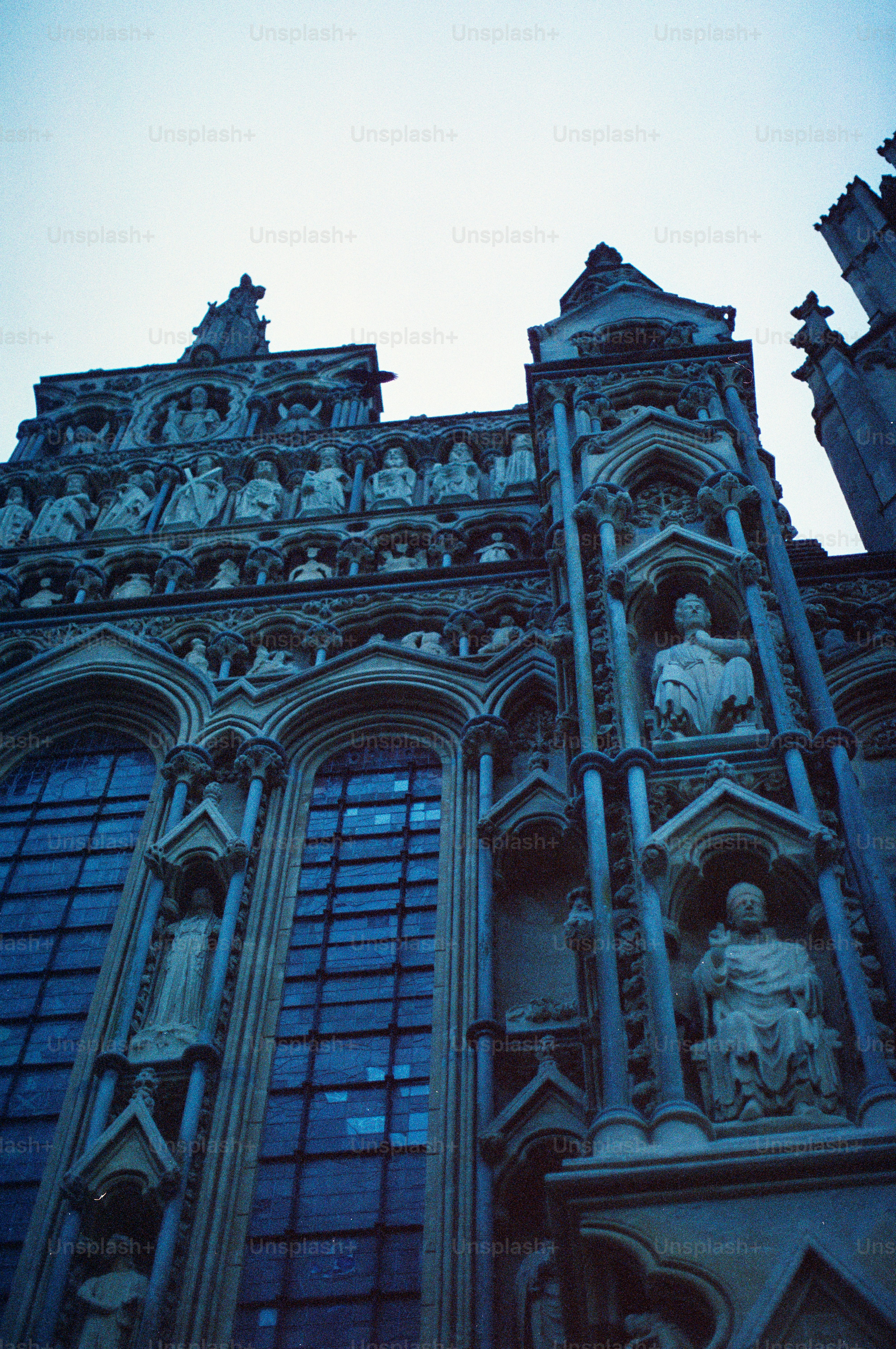Gothic cathedral architecture with ornate statues and windows
