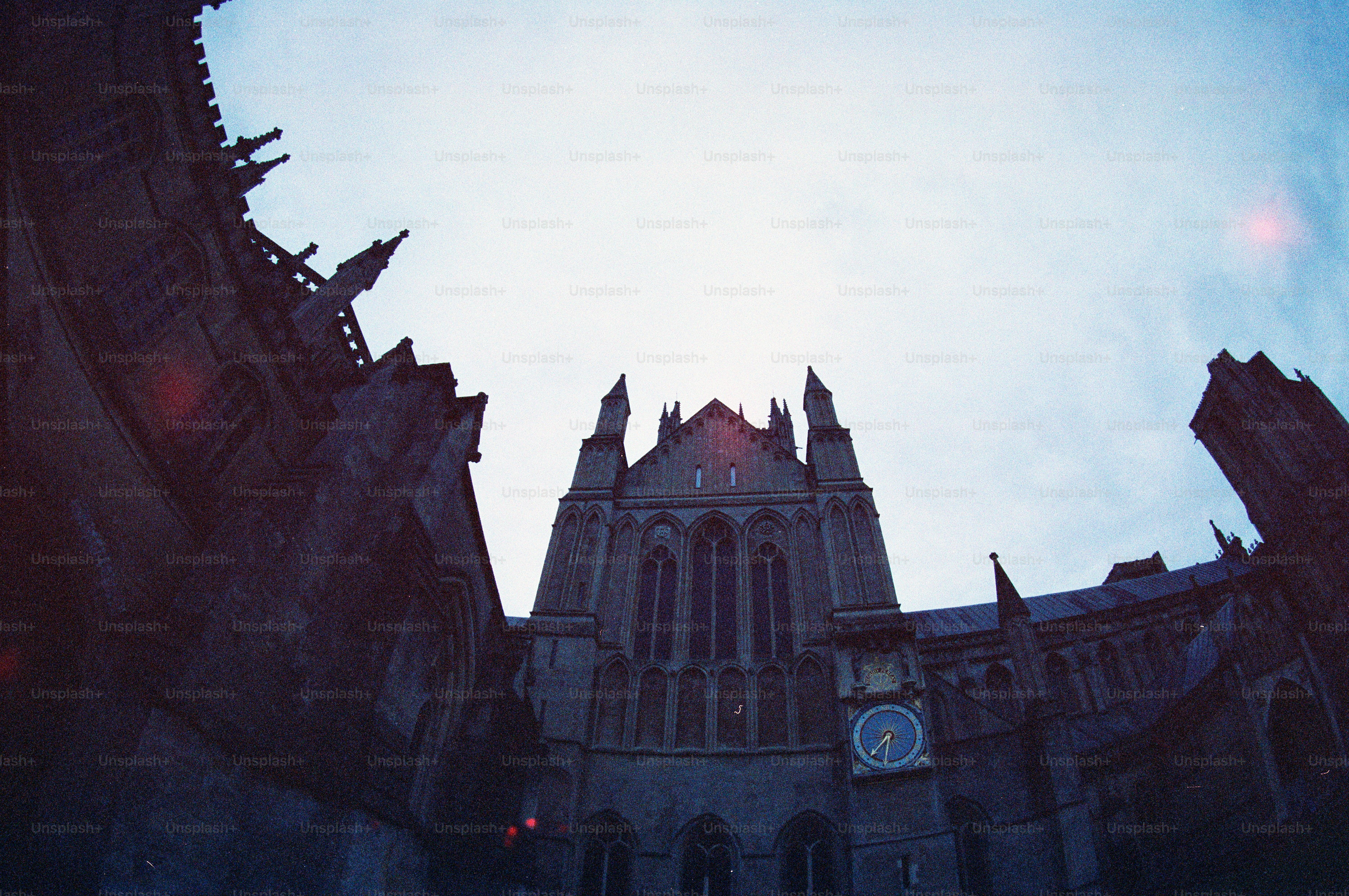Gothic cathedral architecture against a bright sky