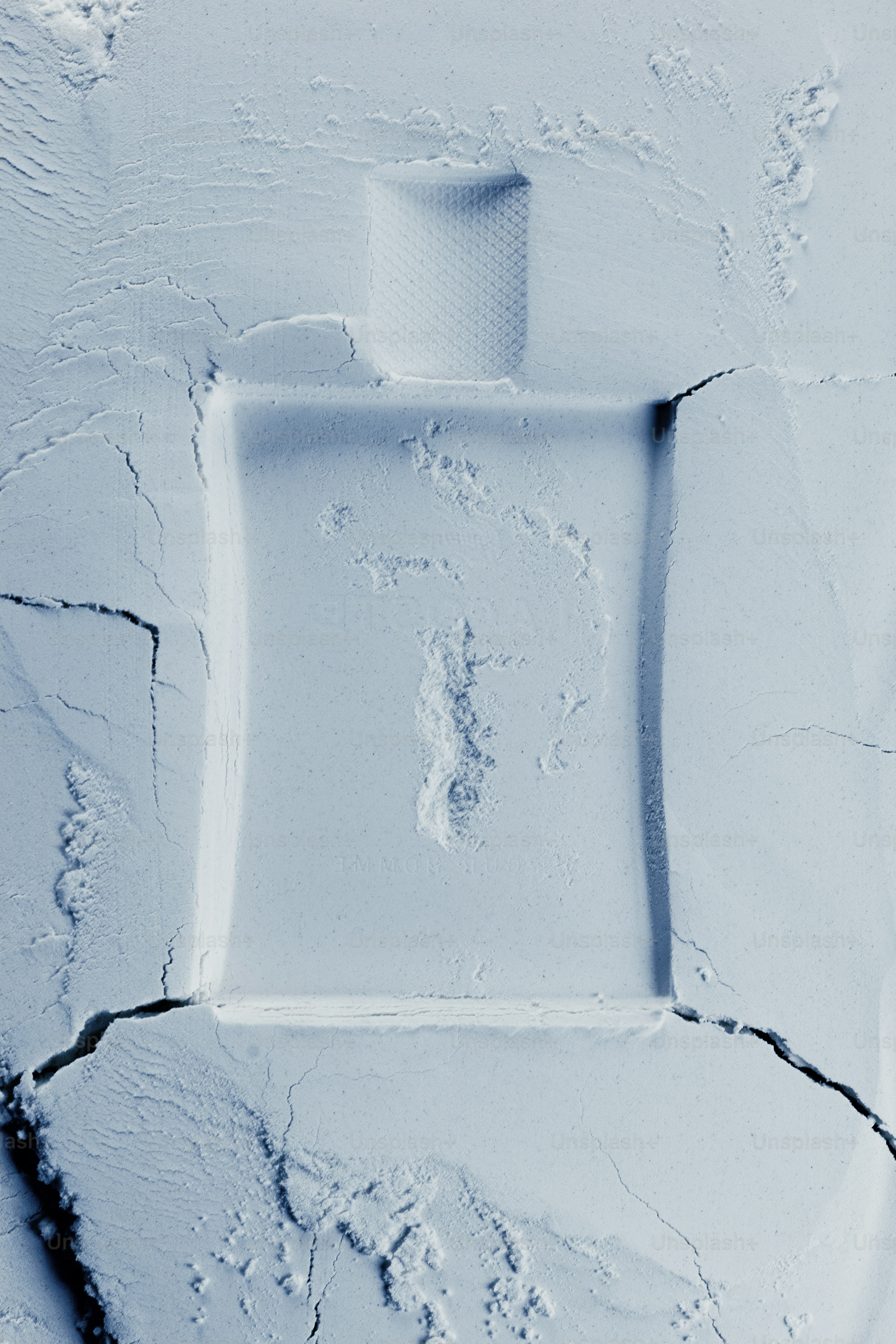 A bottle shape pressed into a powder photo – Skincare Image on Unsplash