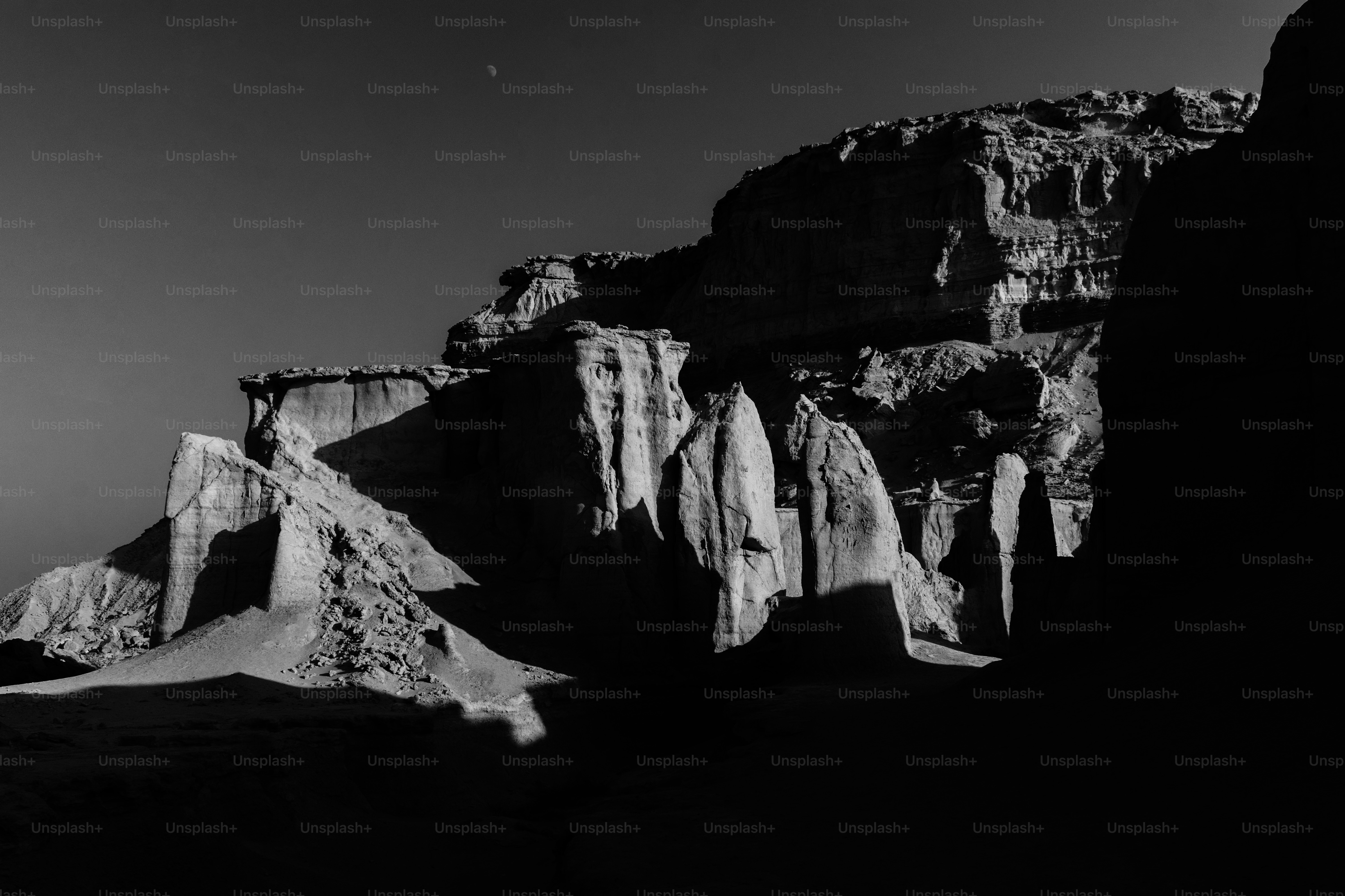 Dramatic rock formations under a clear night sky. photo – Earth Image ...