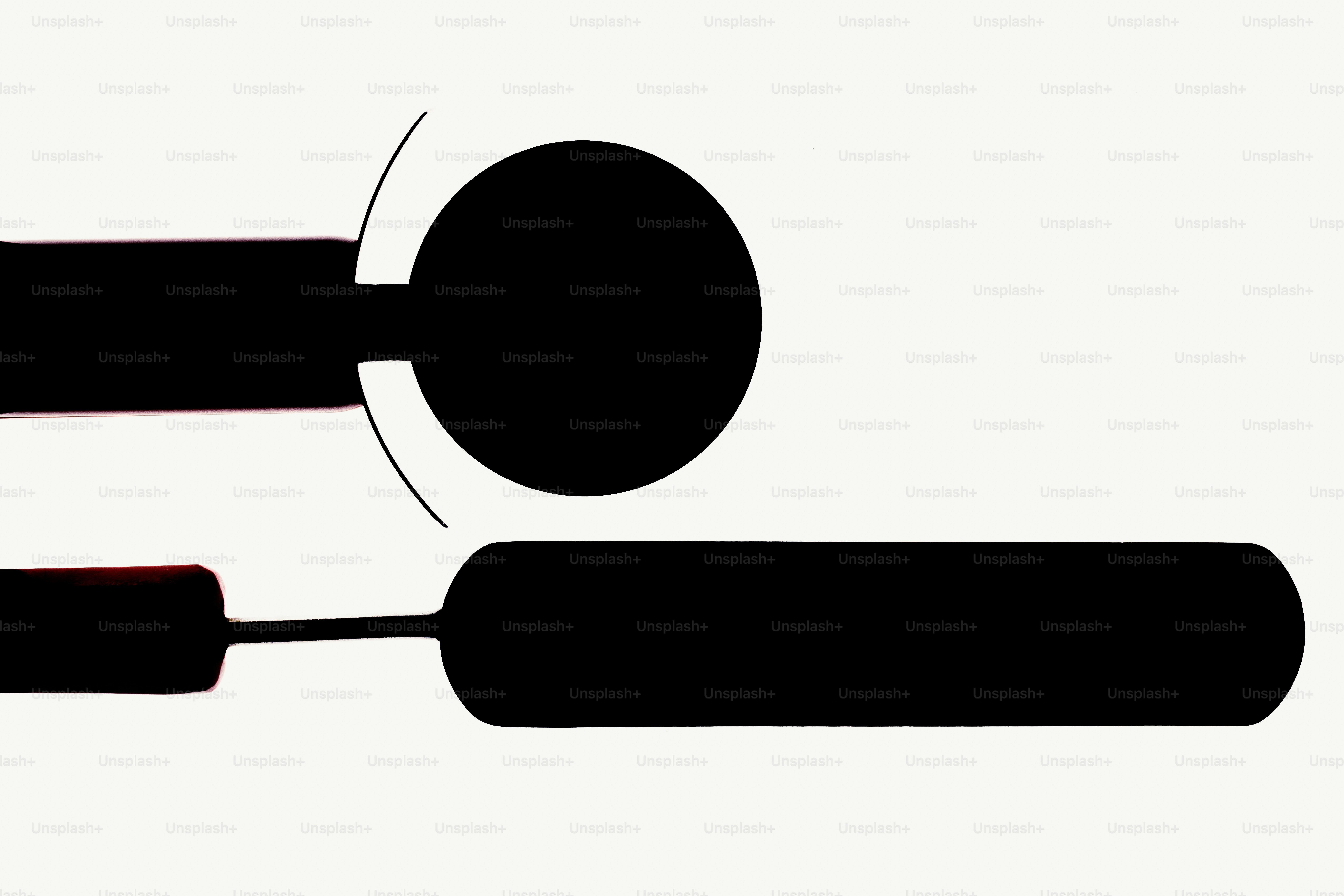 Two black shapes on a white background