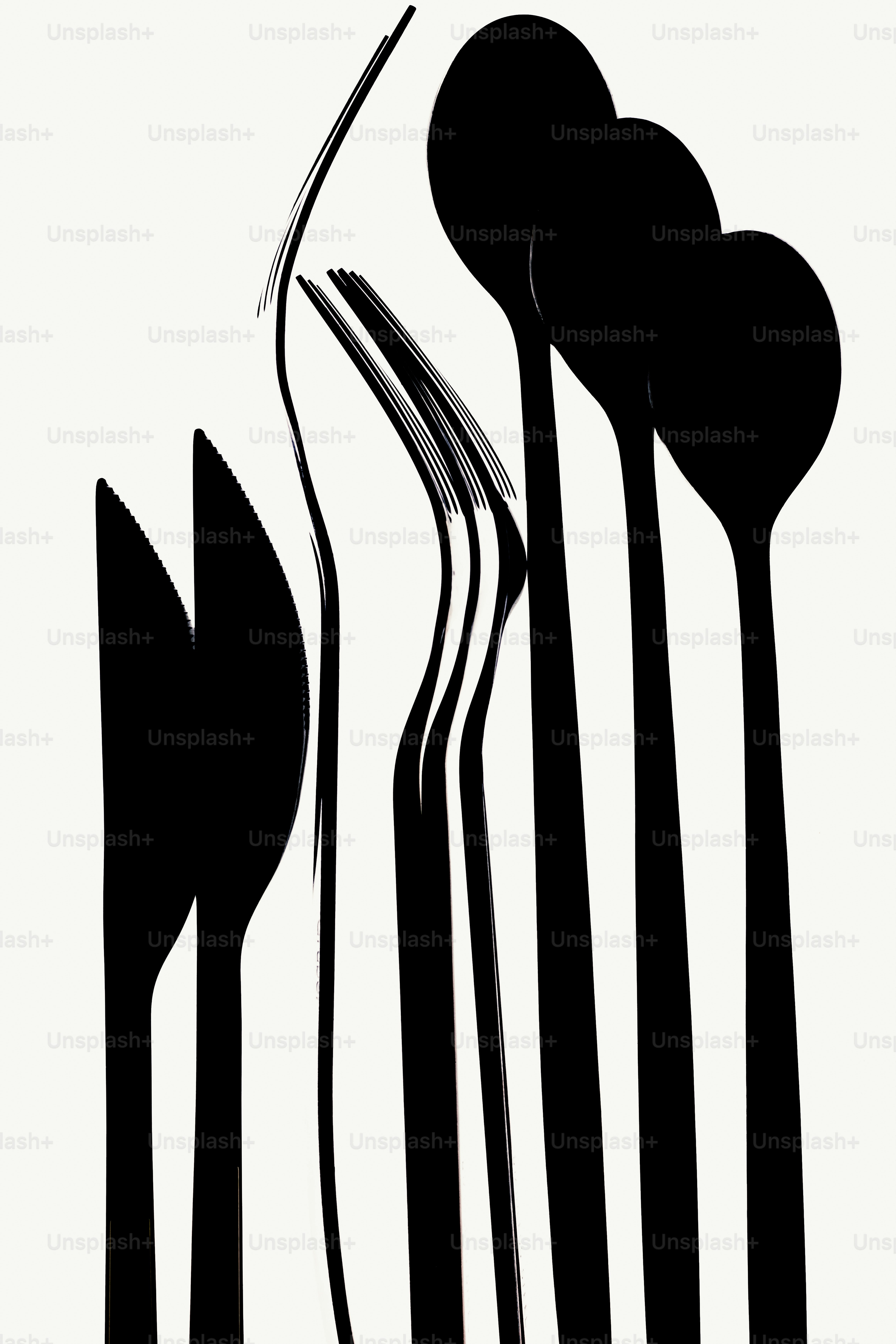 Black cutlery silhouettes against a white background