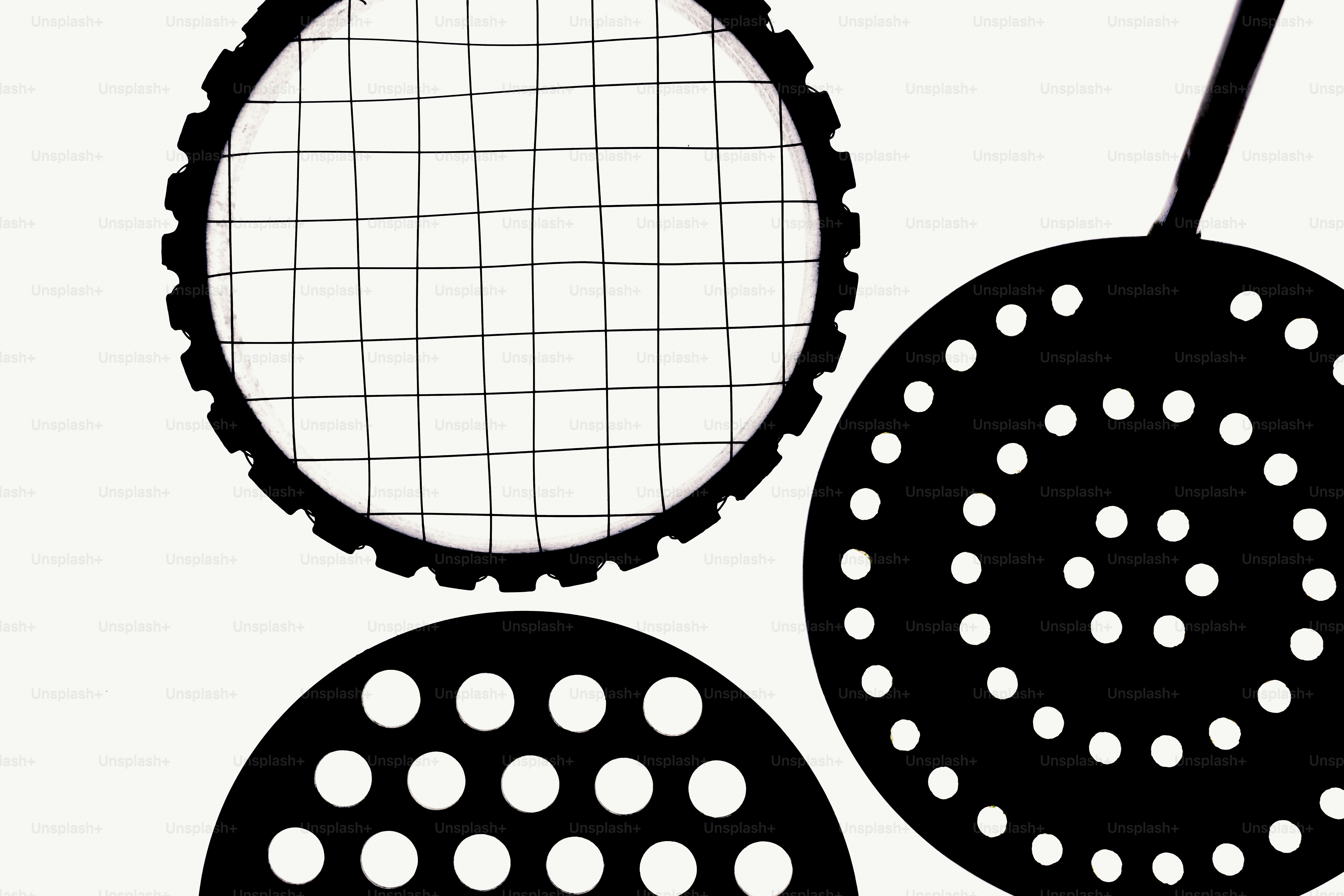 Three kitchen strainers with different hole patterns photo – Texture ...