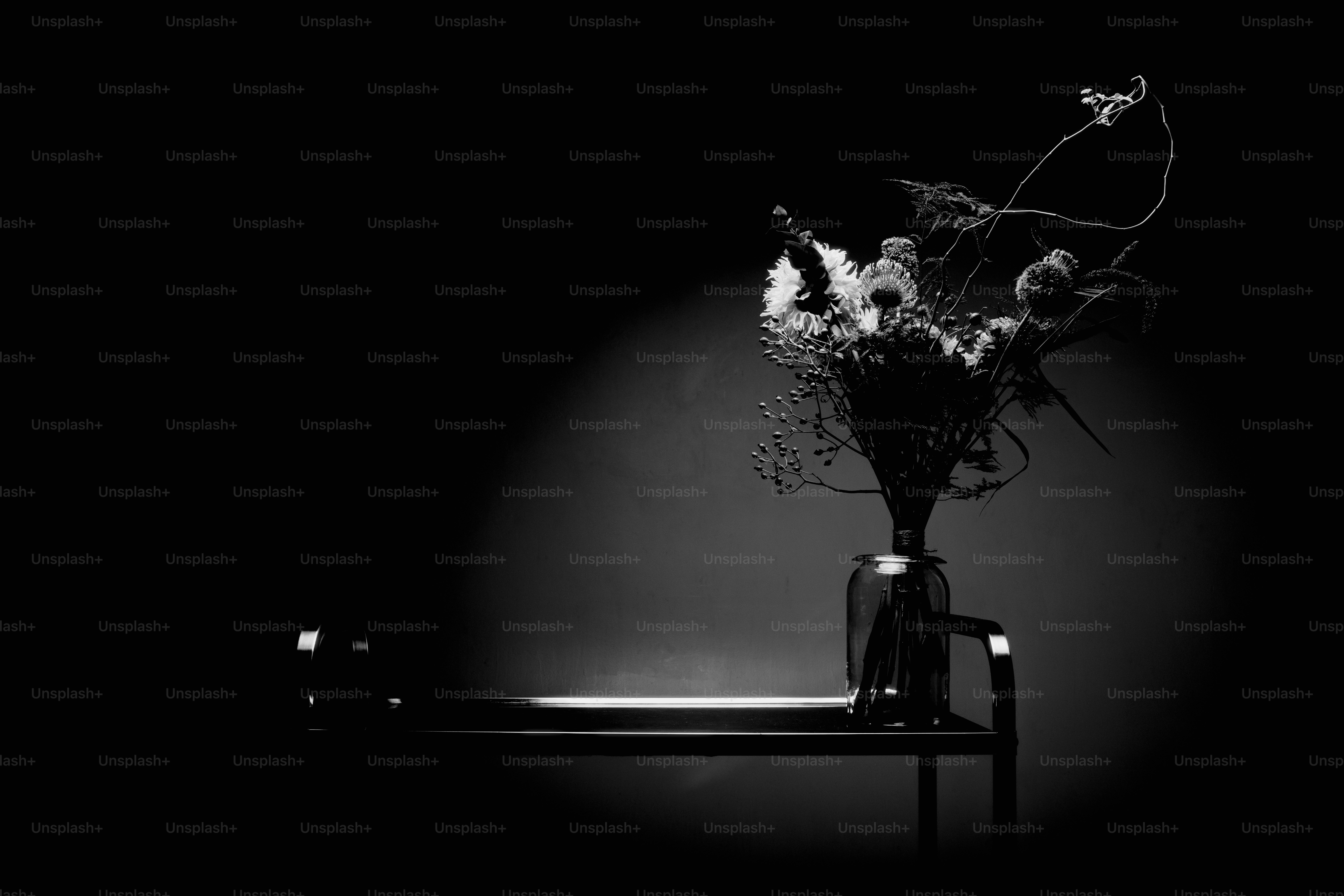 Dried flowers in a vase on a shelf