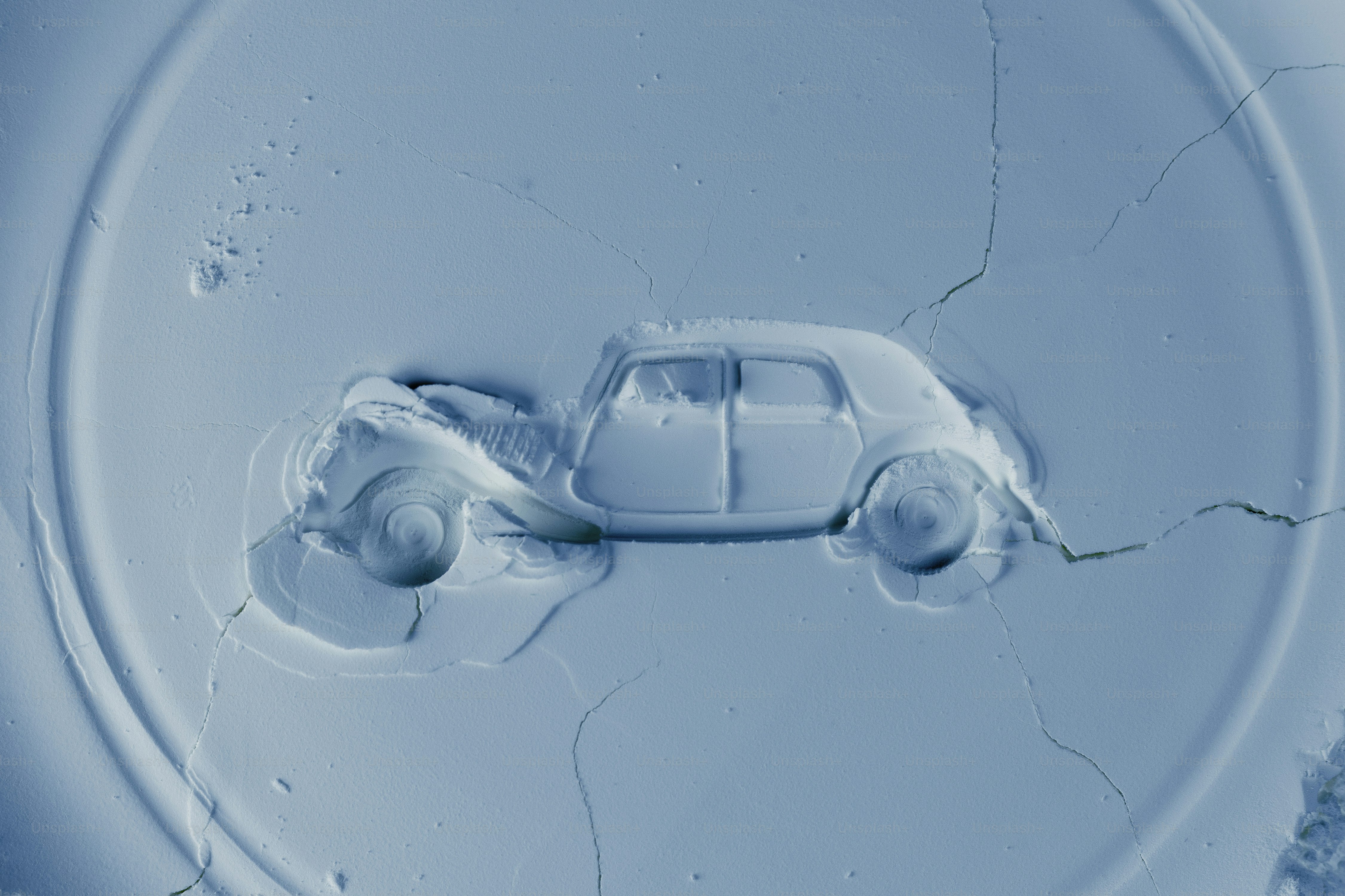 A vintage car embossed on a textured surface. photo – Car Image on Unsplash