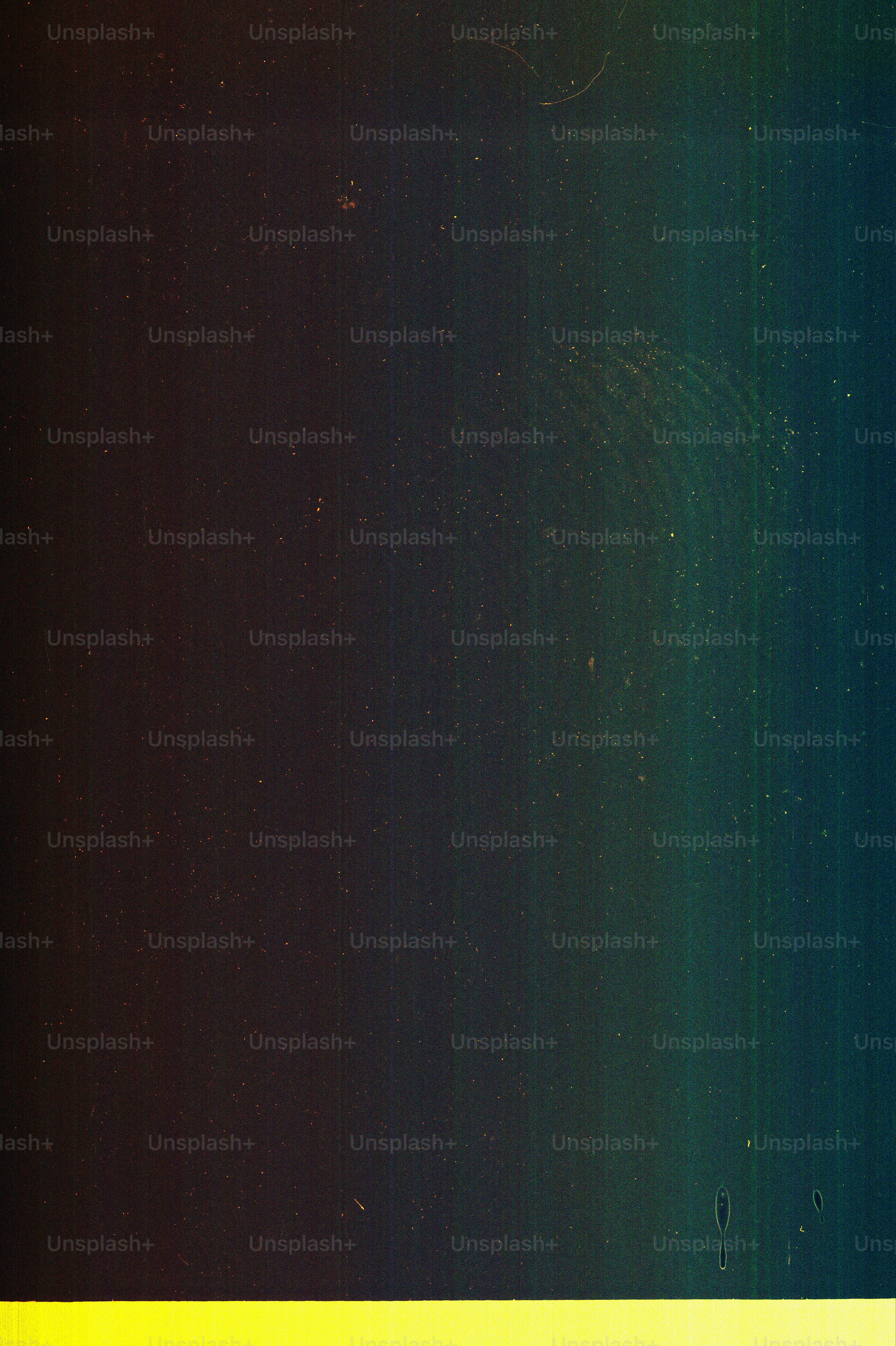 Dark background with yellow stripe and dust