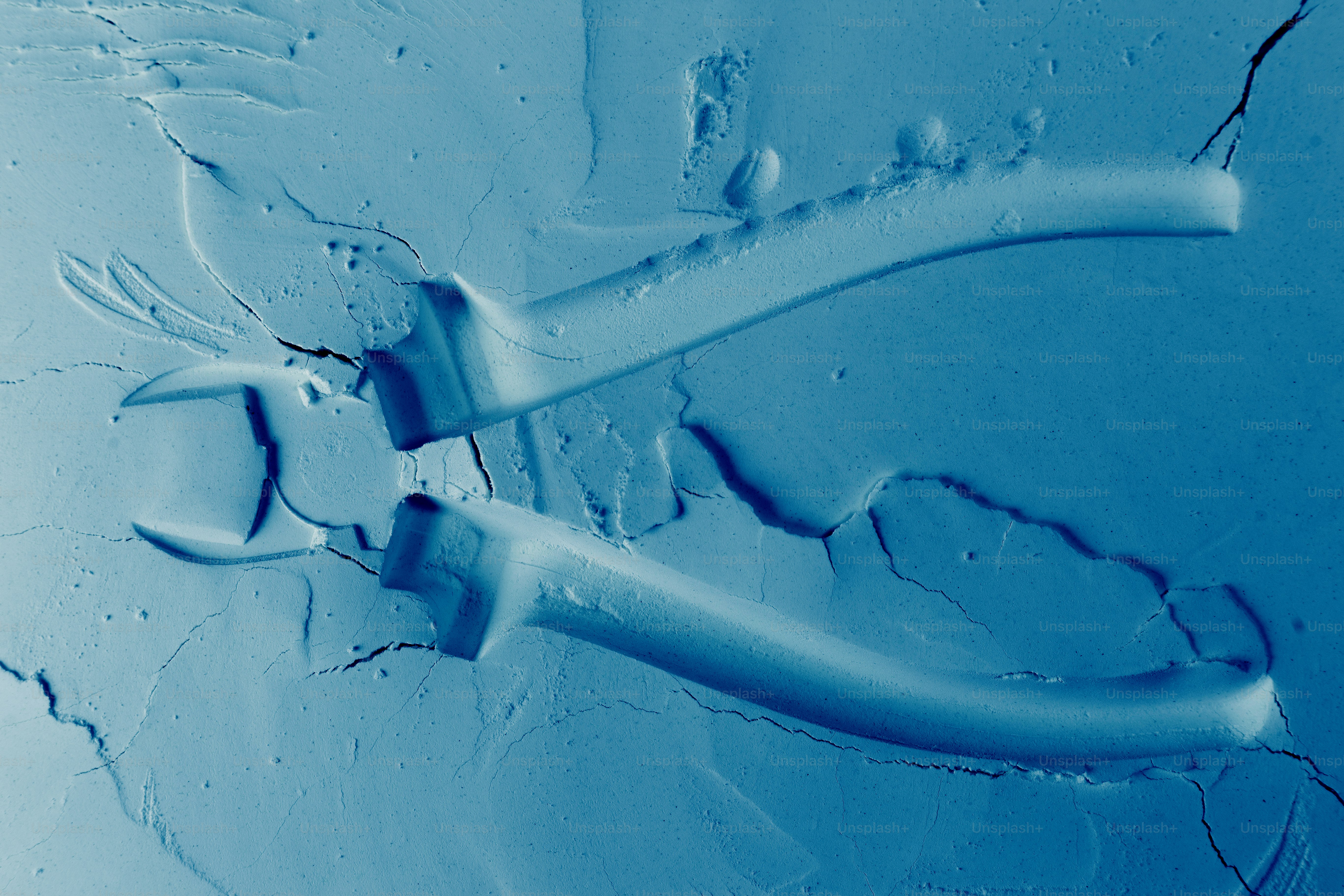 Close-up of pliers on a blue background