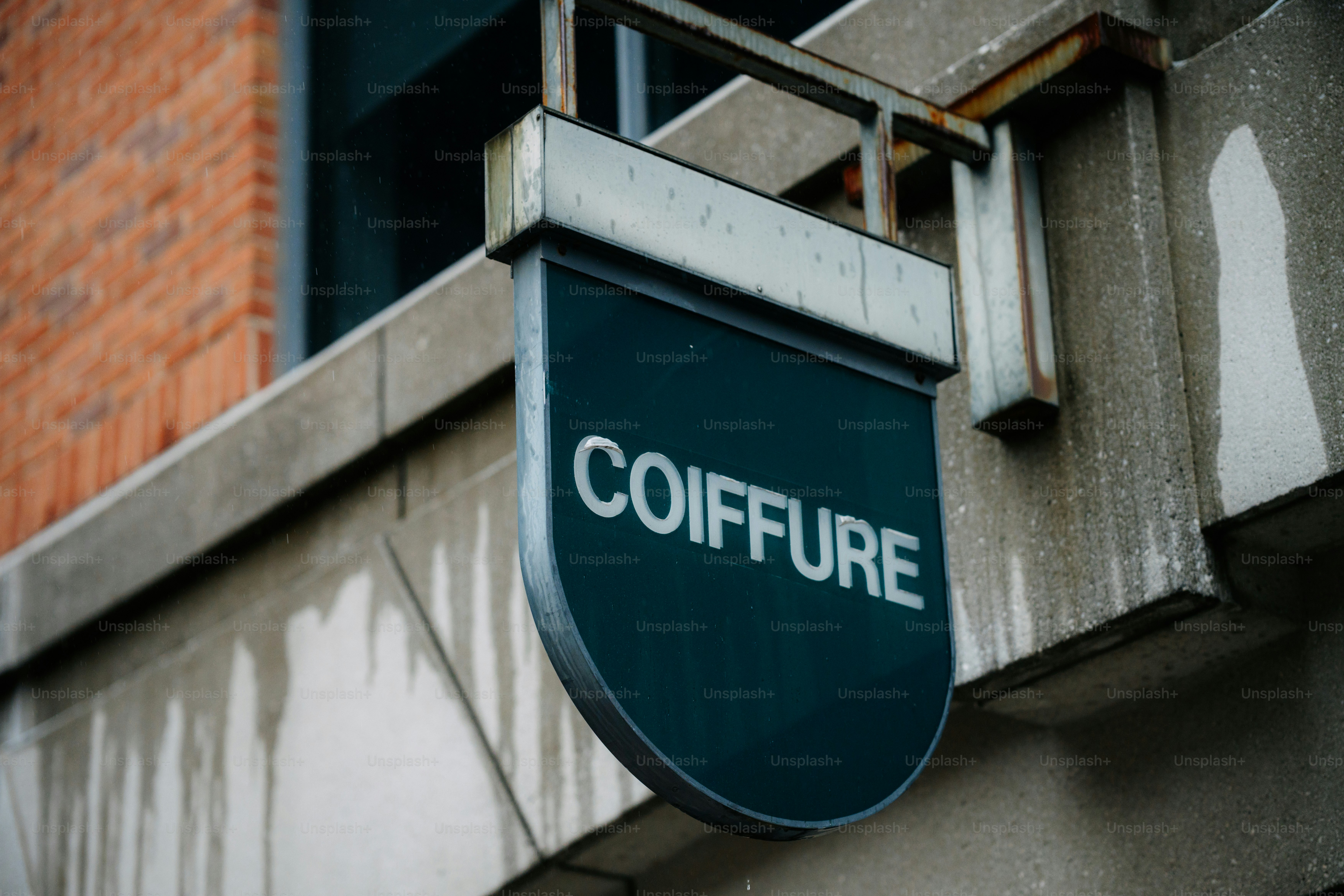 A "coiffure" sign on a building
