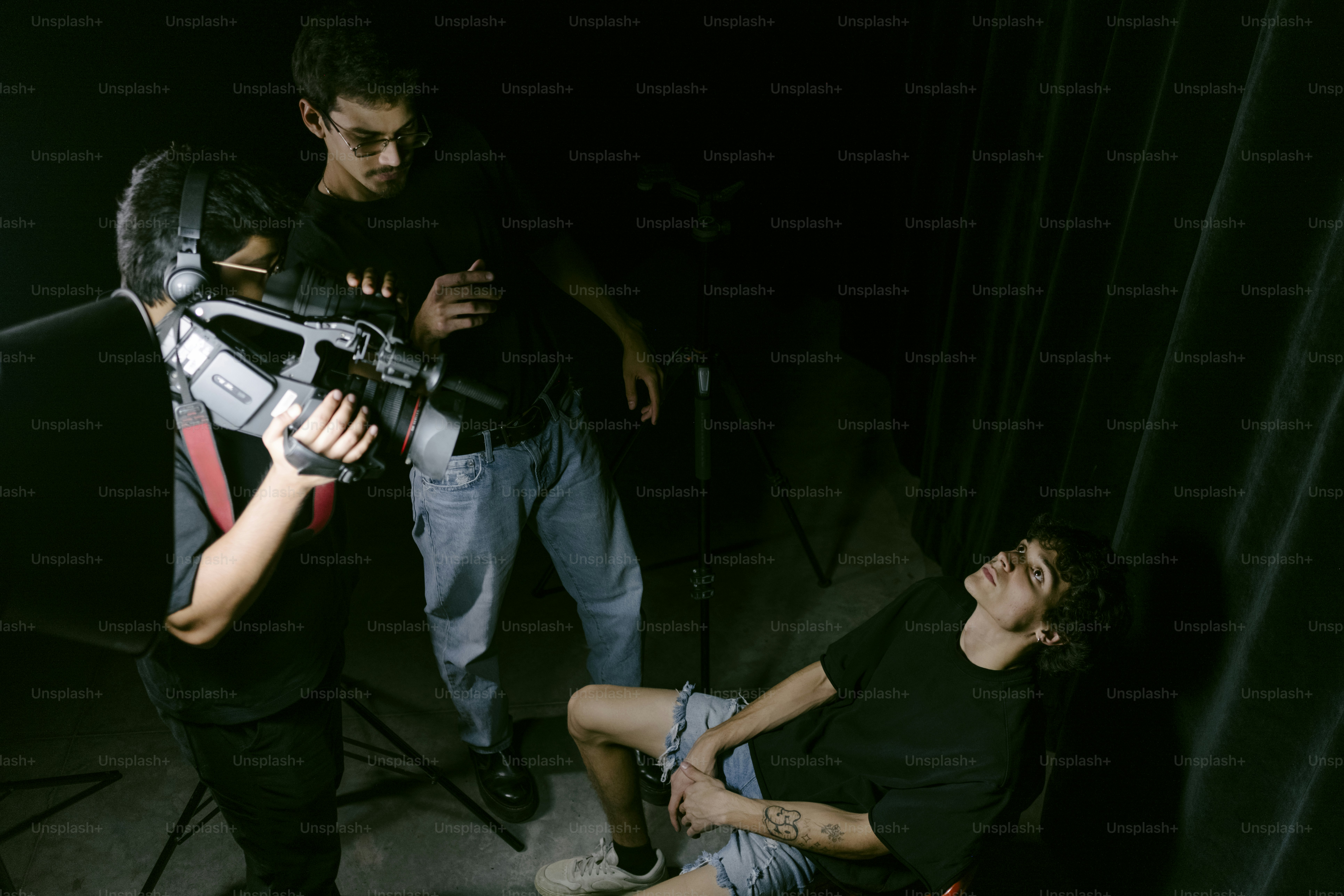 Filming a scene with a camera and green screen. photo – Cinematic Image ...