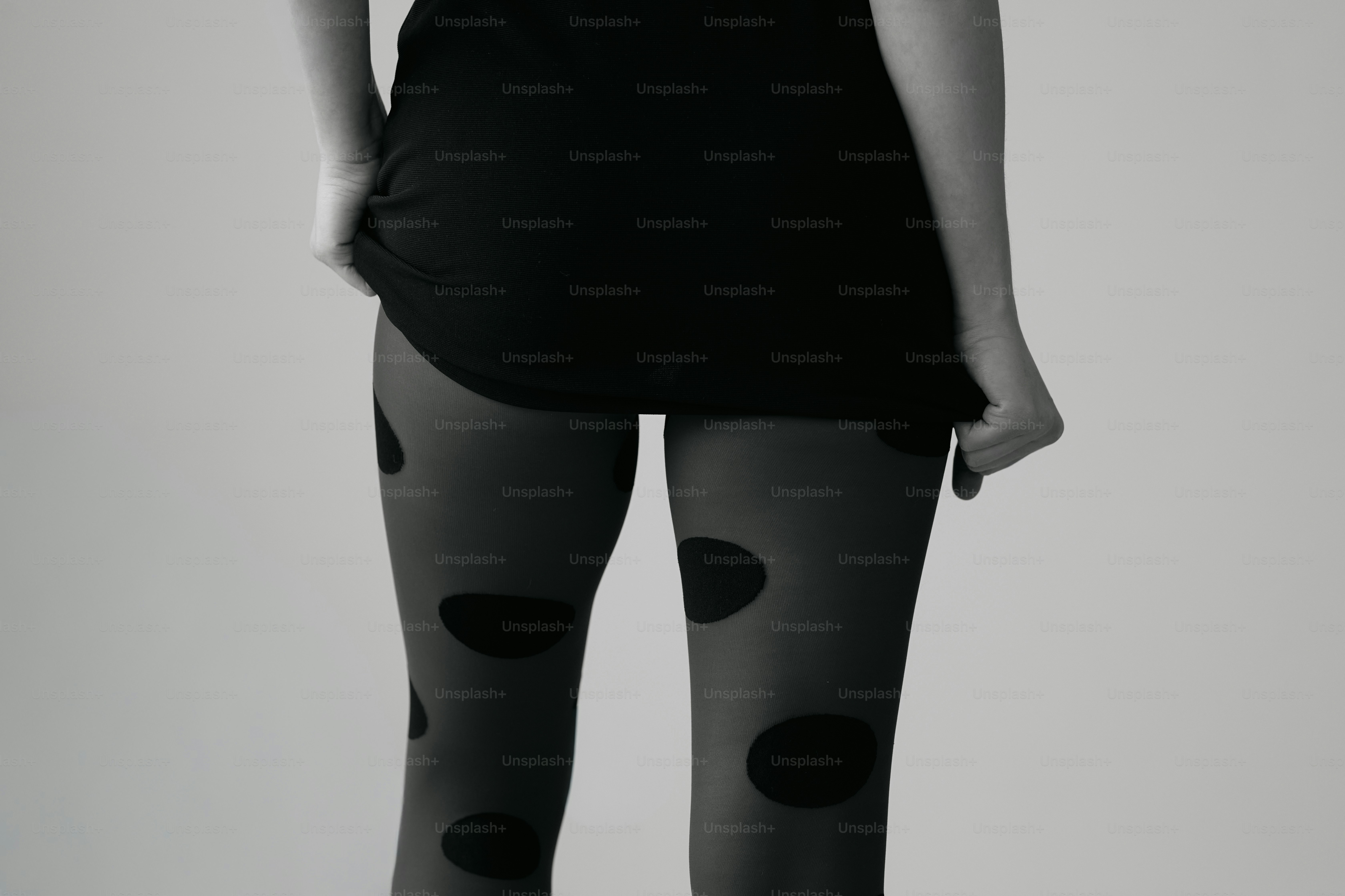 Woman wearing polka dot tights and black dress photo  Texture Image on  Unsplash