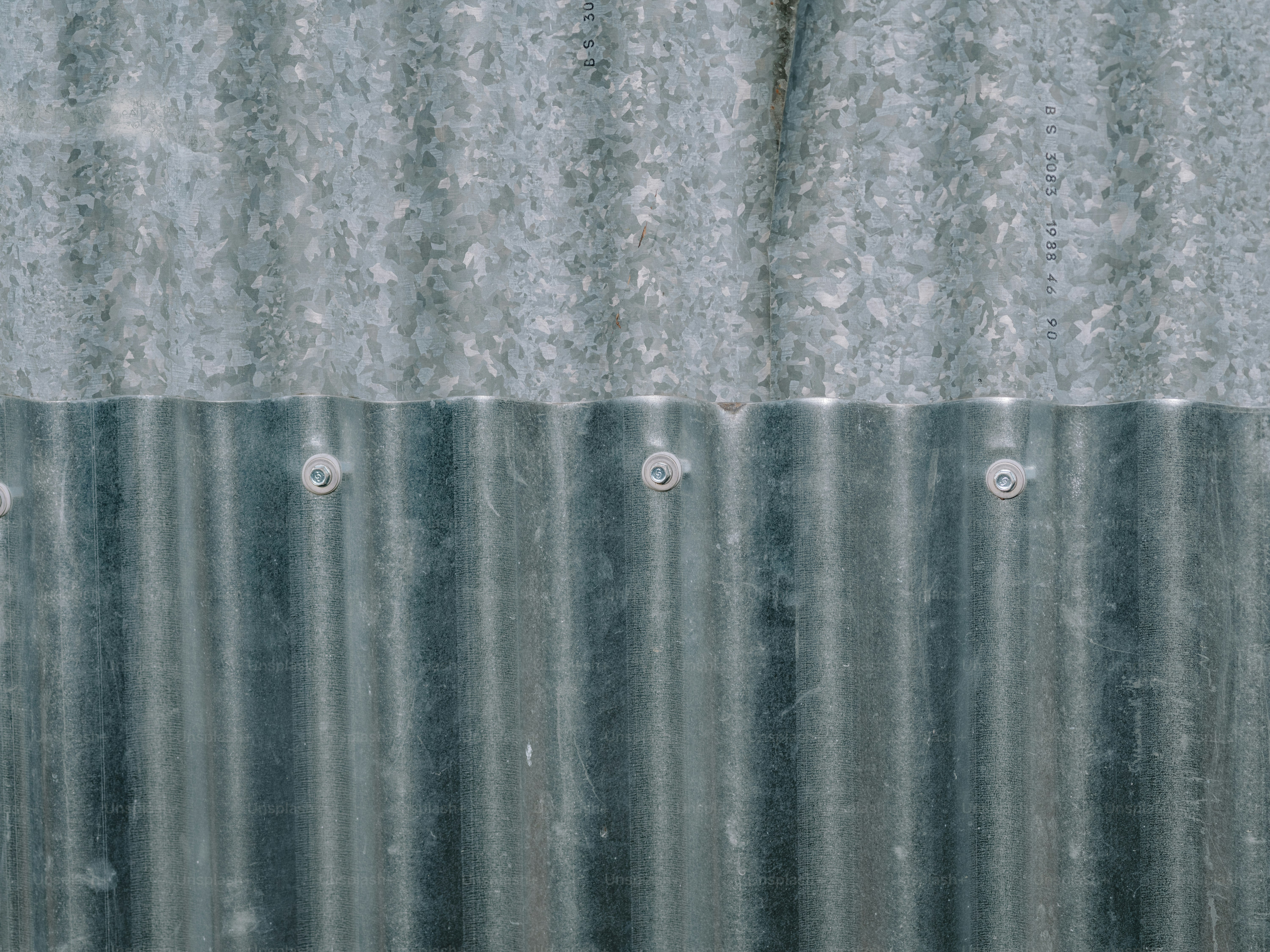 Corrugated metal sheets with visible rivets