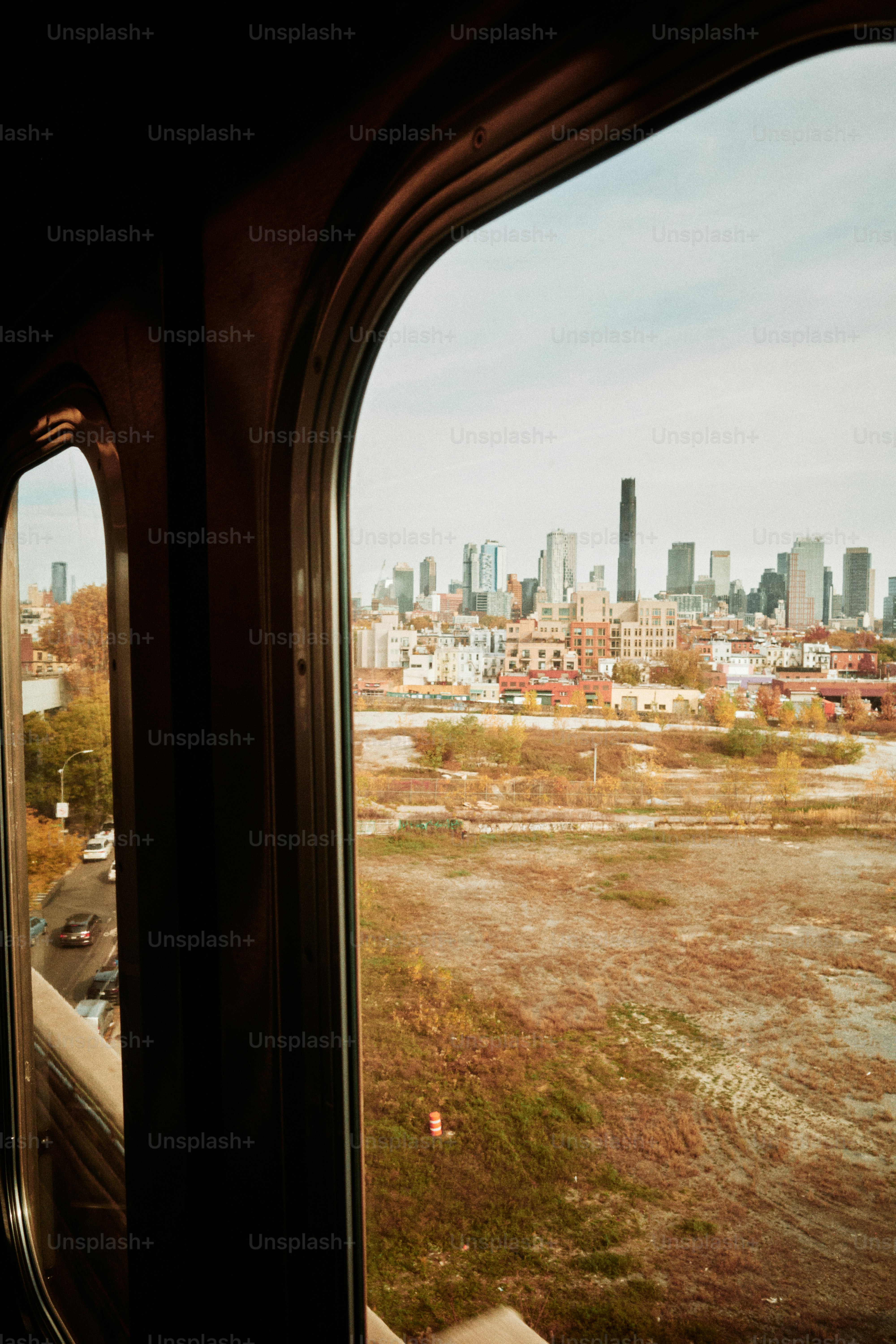 City skyline seen through a train window photo – Travel Image on Unsplash