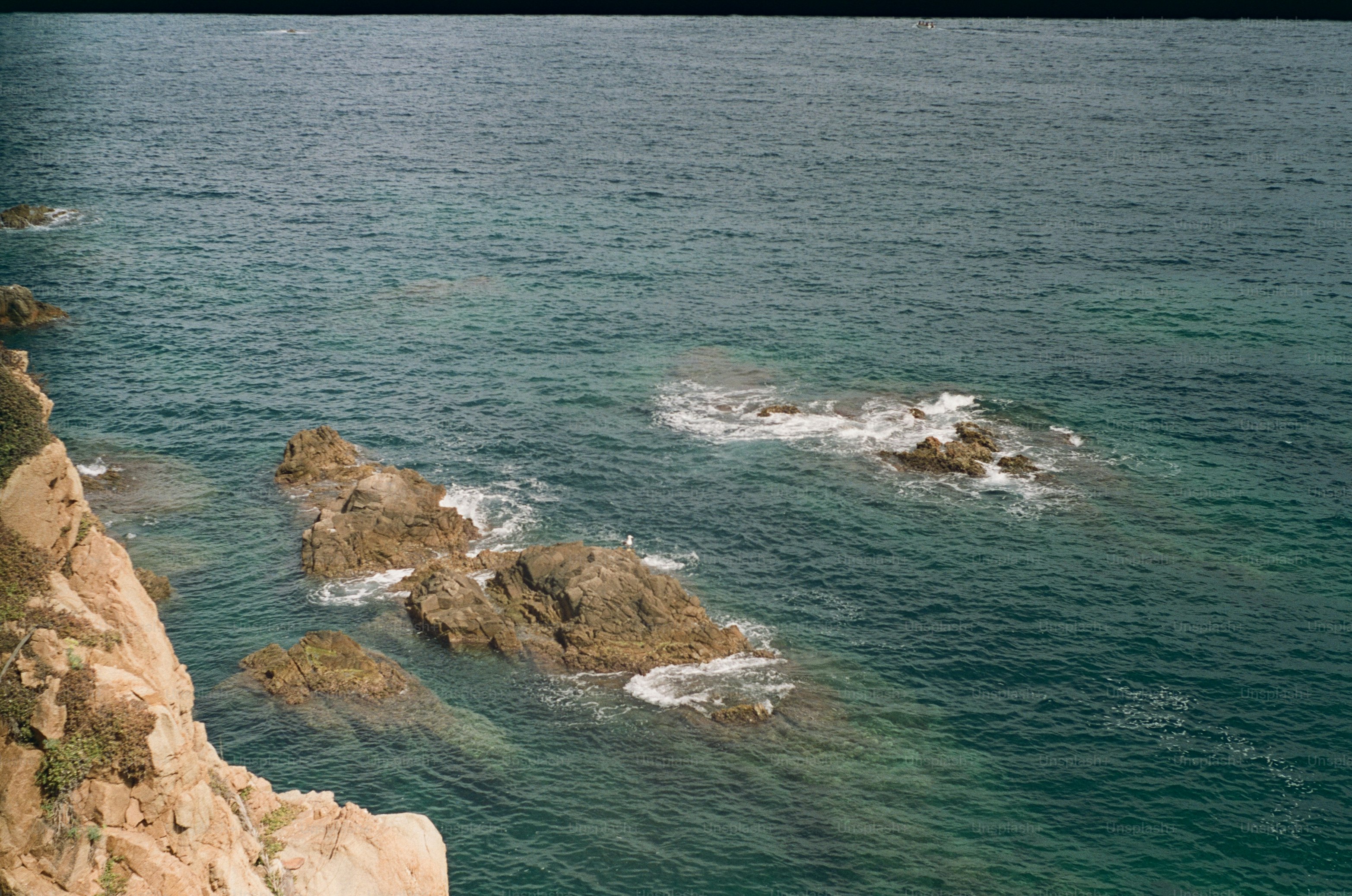 Rocky coastline with waves crashing on shore