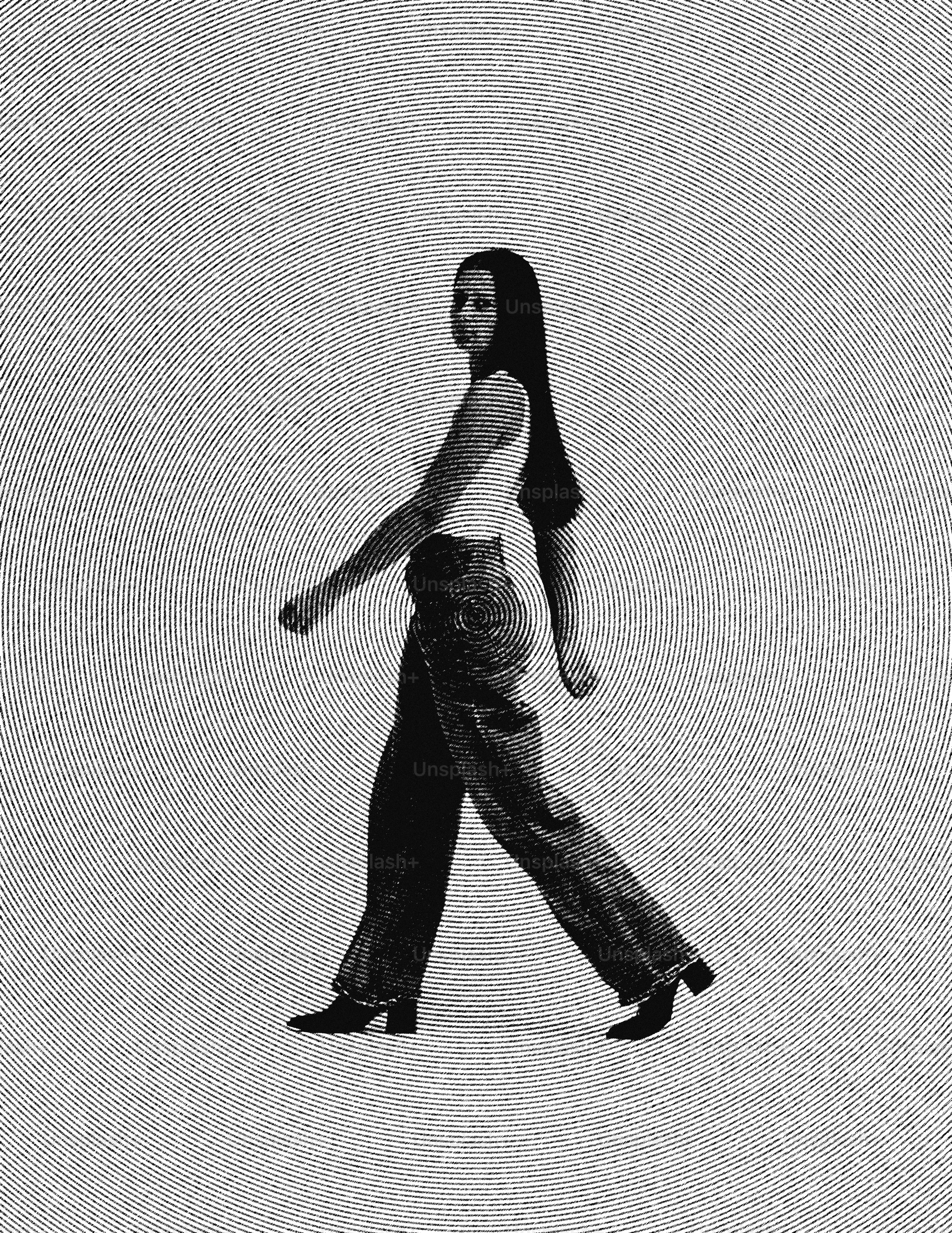 Woman in jeans walking against white background