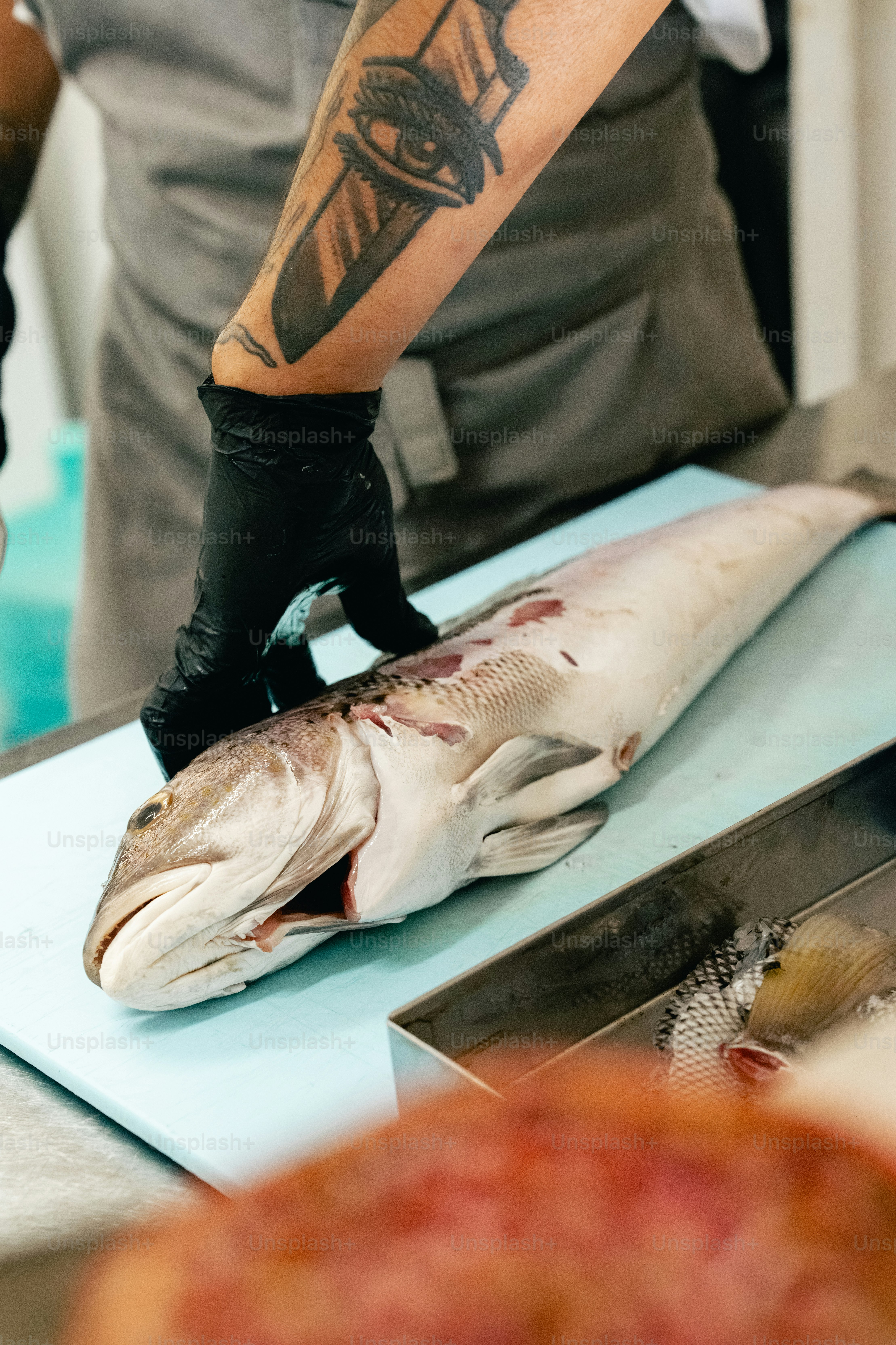 Chef prepares fish on a cutting board photo – Food Image on Unsplash