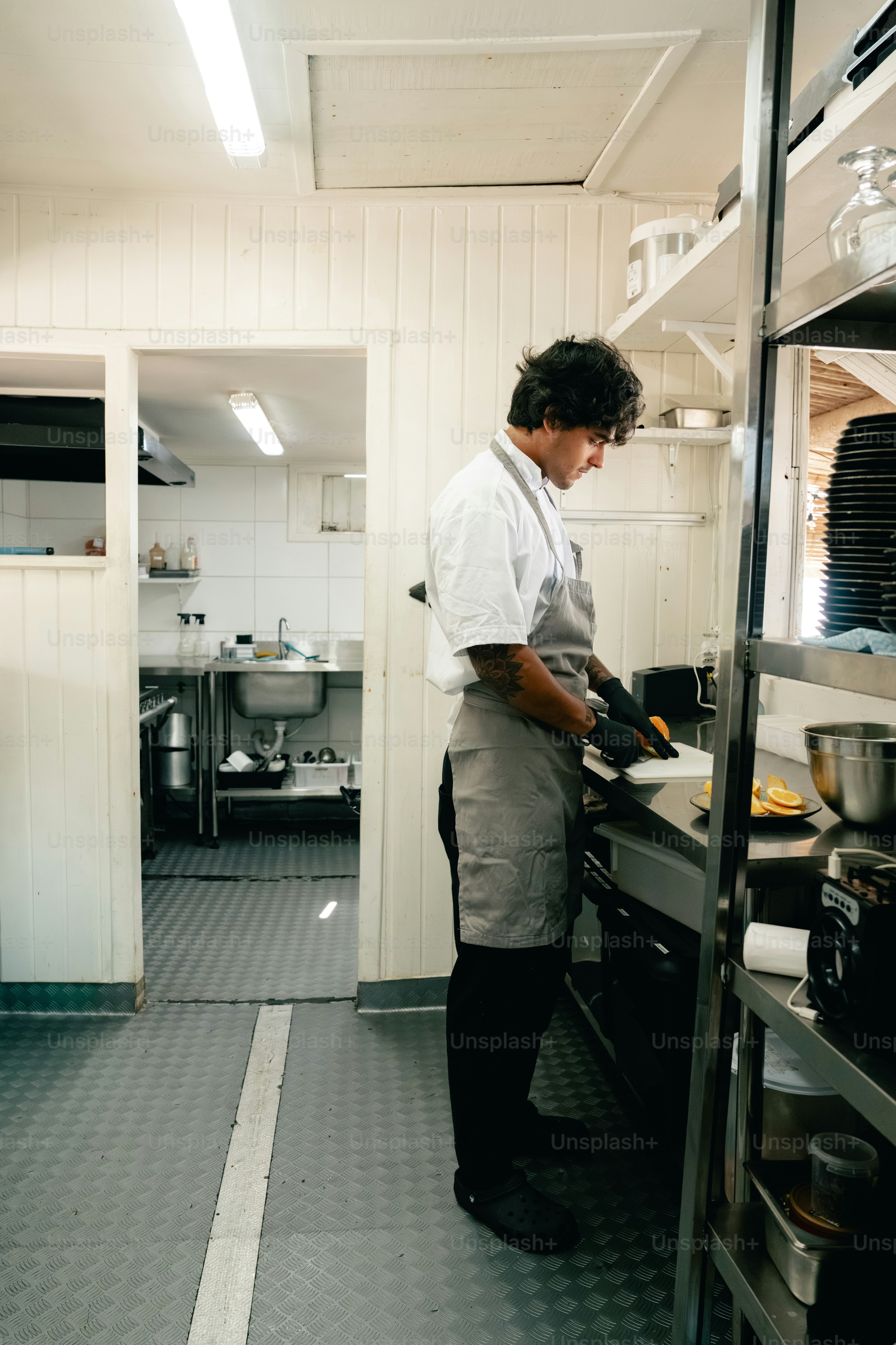 A chef working in a commercial kitchen