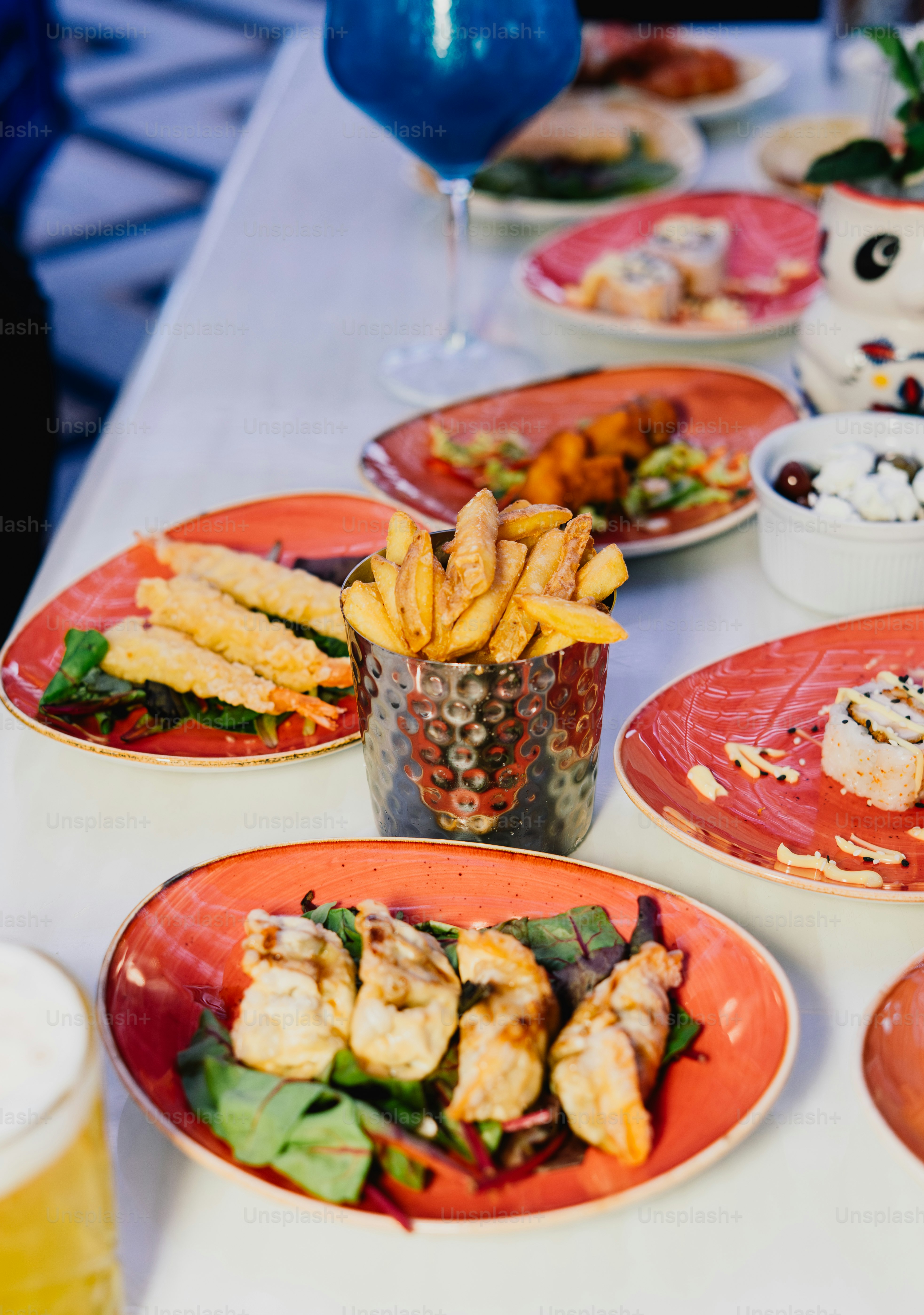 Various dishes of food served on plates