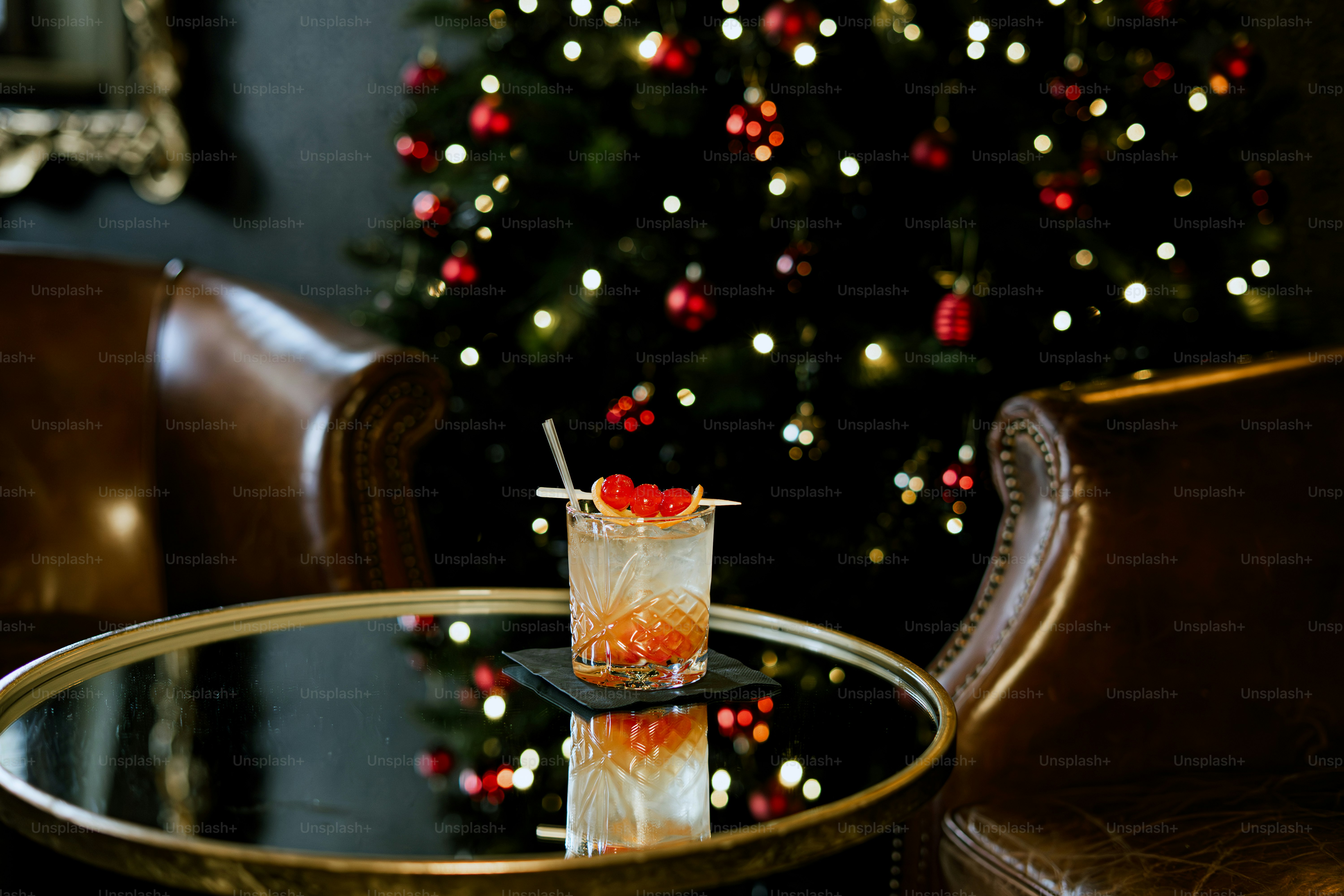 Cocktail on table with christmas tree background