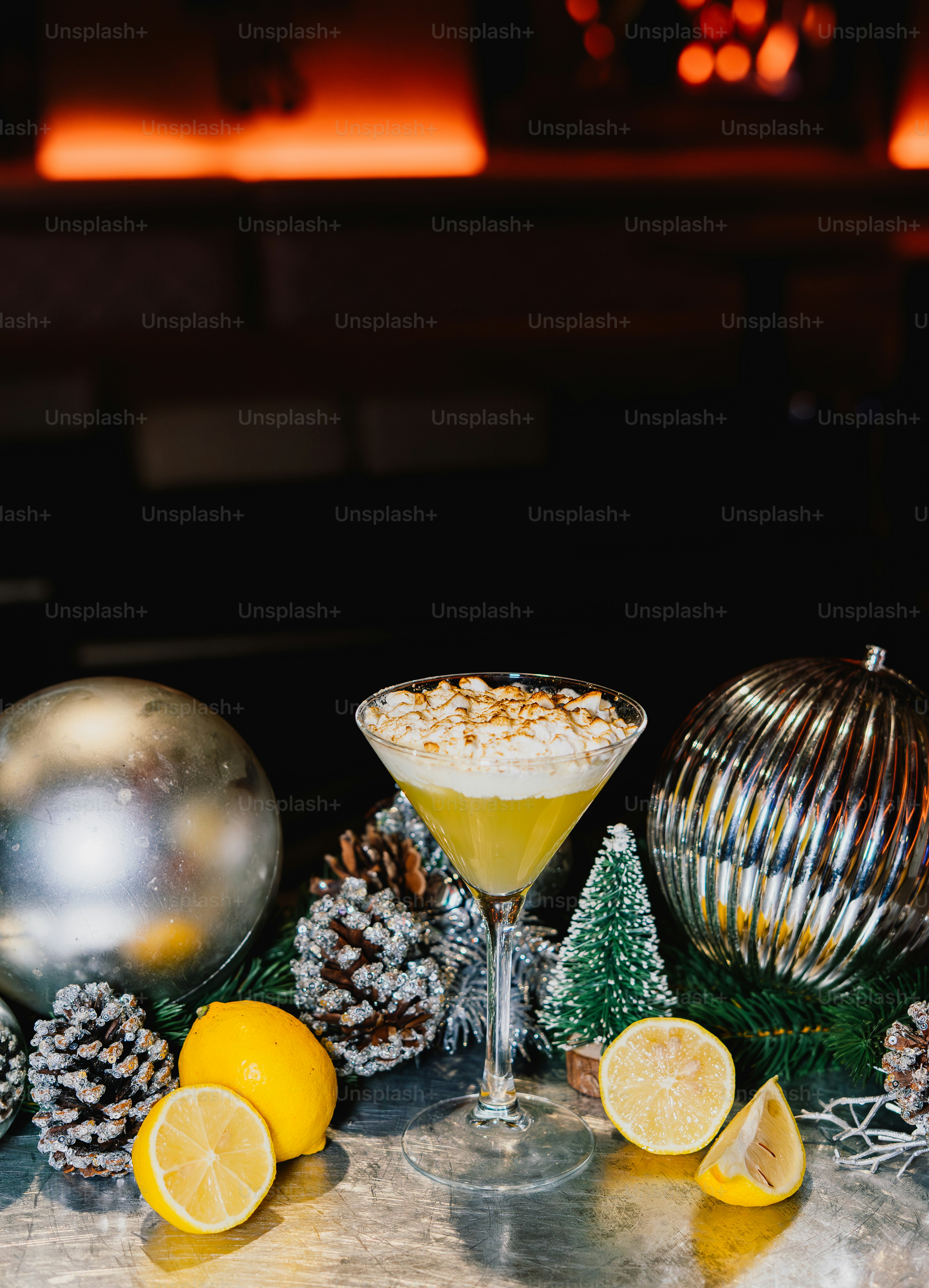 A festive cocktail with lemons and ornaments