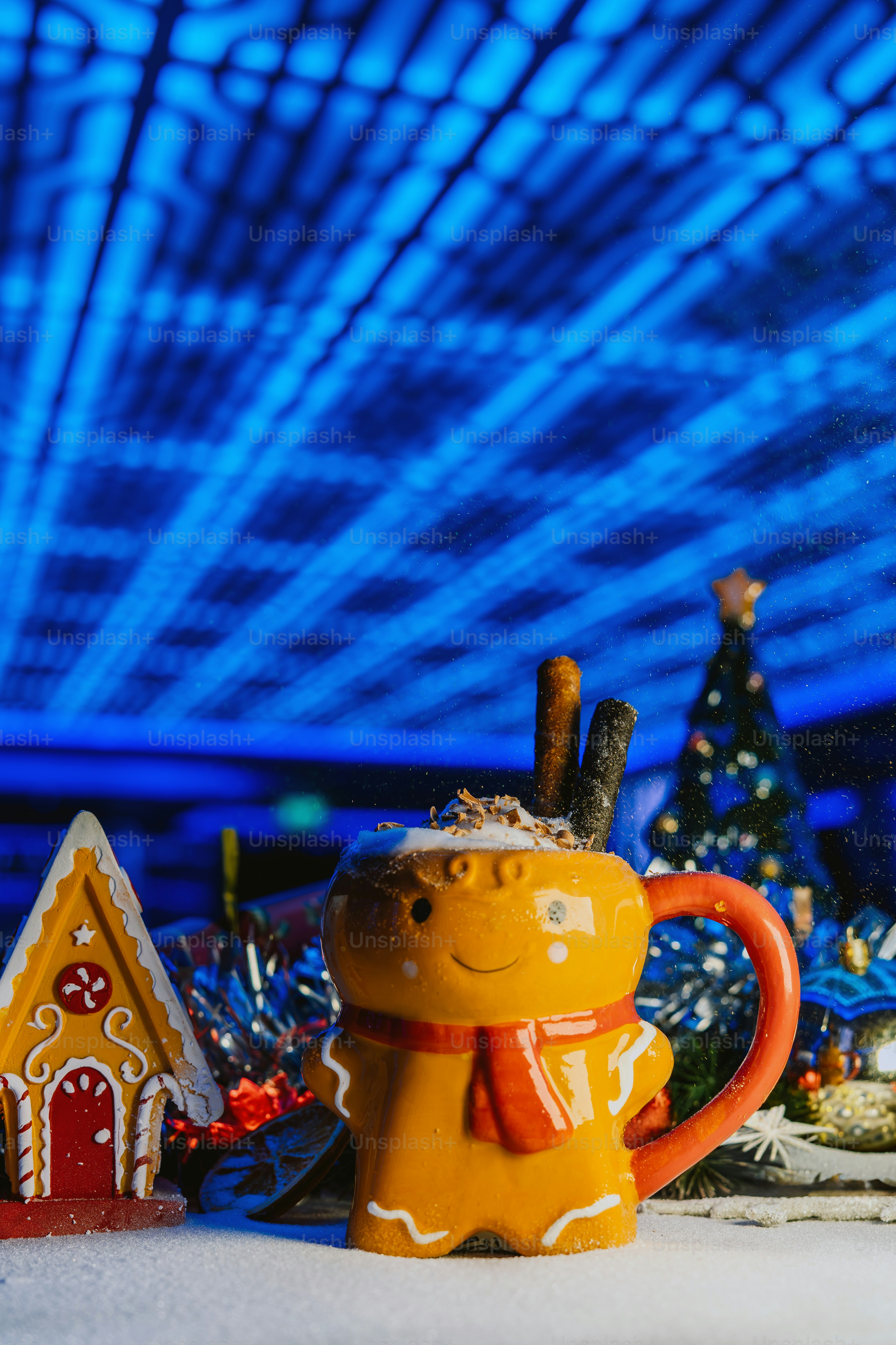 Gingerbread mug with hot chocolate and christmas decorations