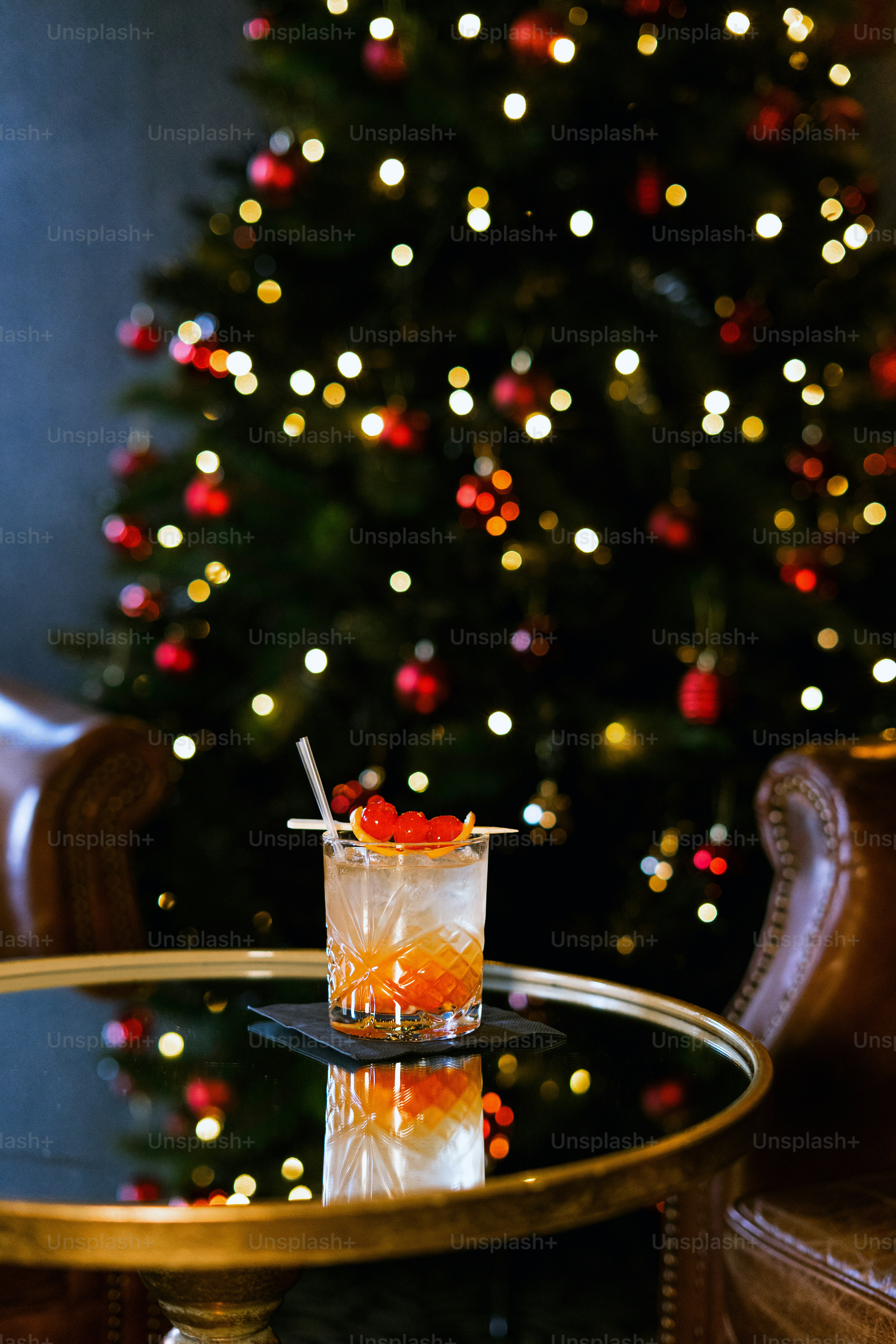 Cocktail on table with christmas tree background