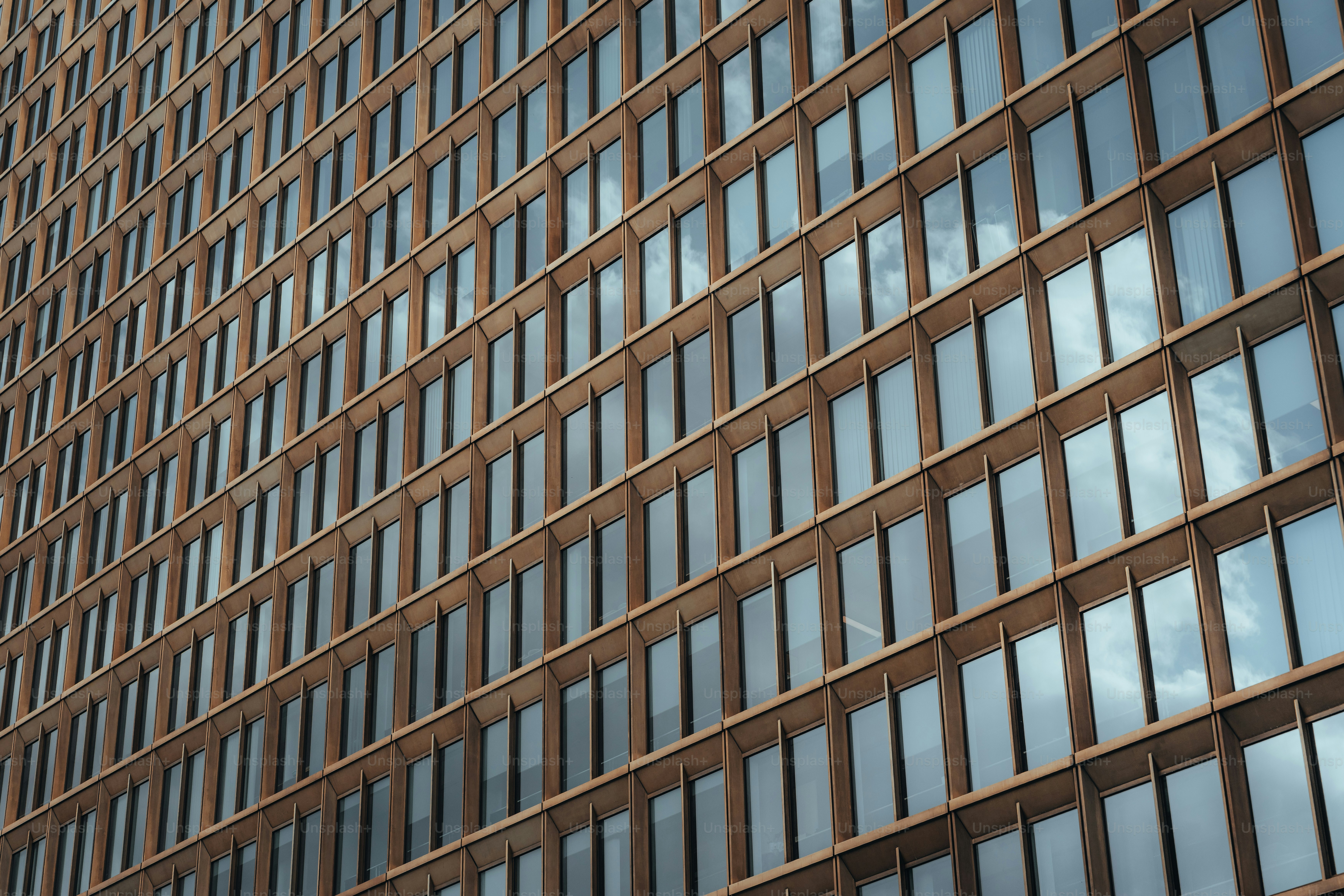 Modern building facade with repeating glass windows