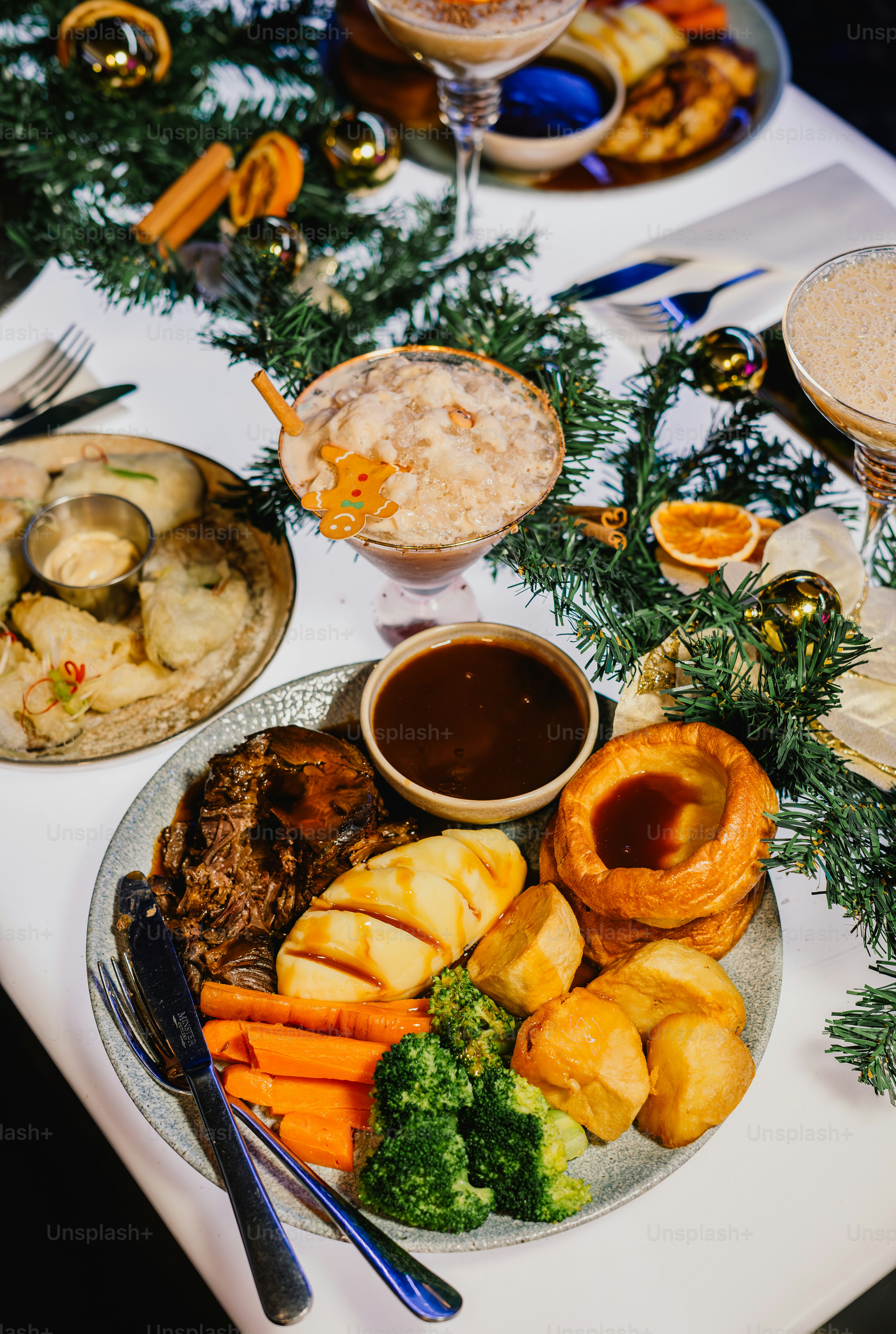 Traditional christmas dinner with roast beef and vegetables.