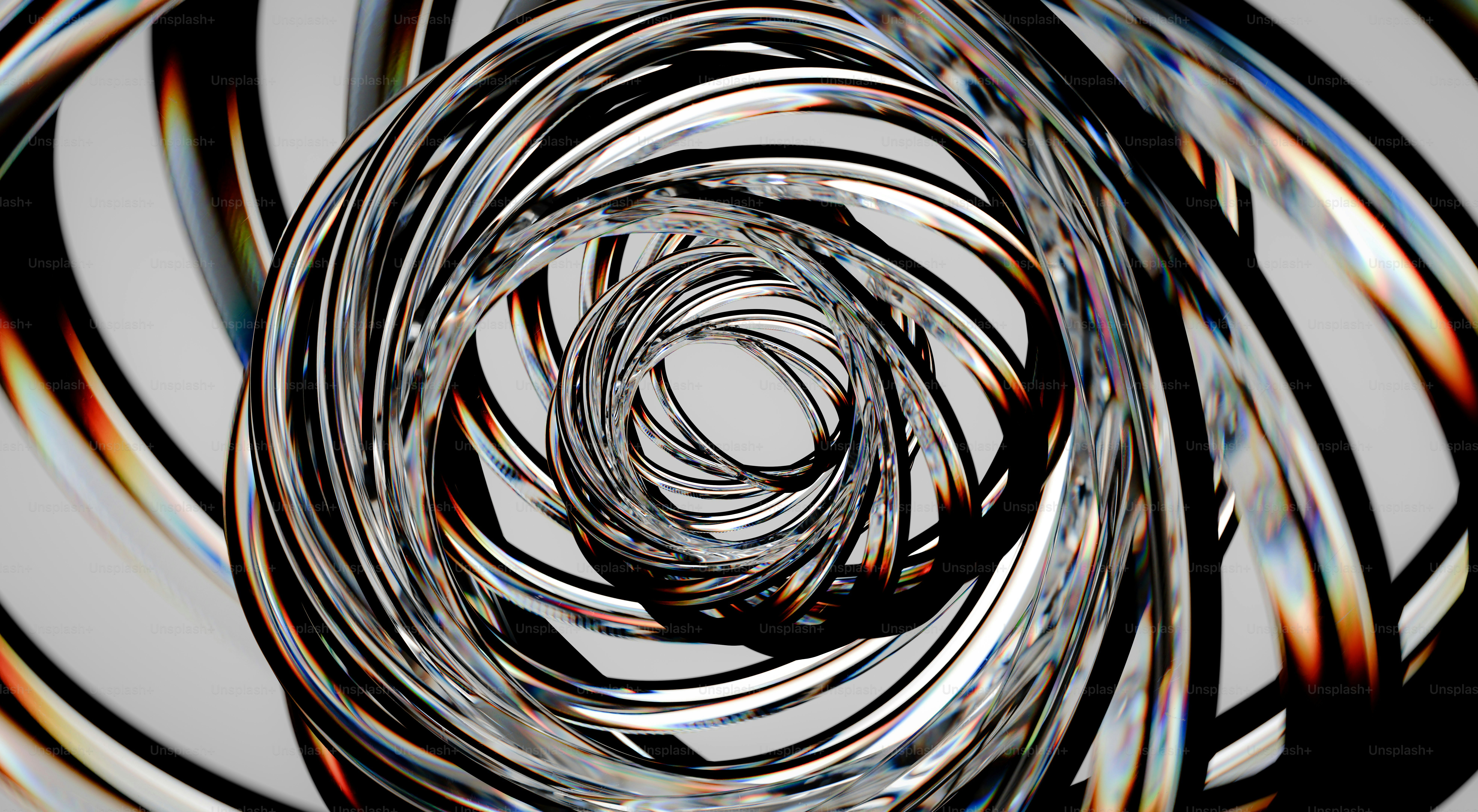 Abstract swirling metallic rings with light refractions. photo – Image ...
