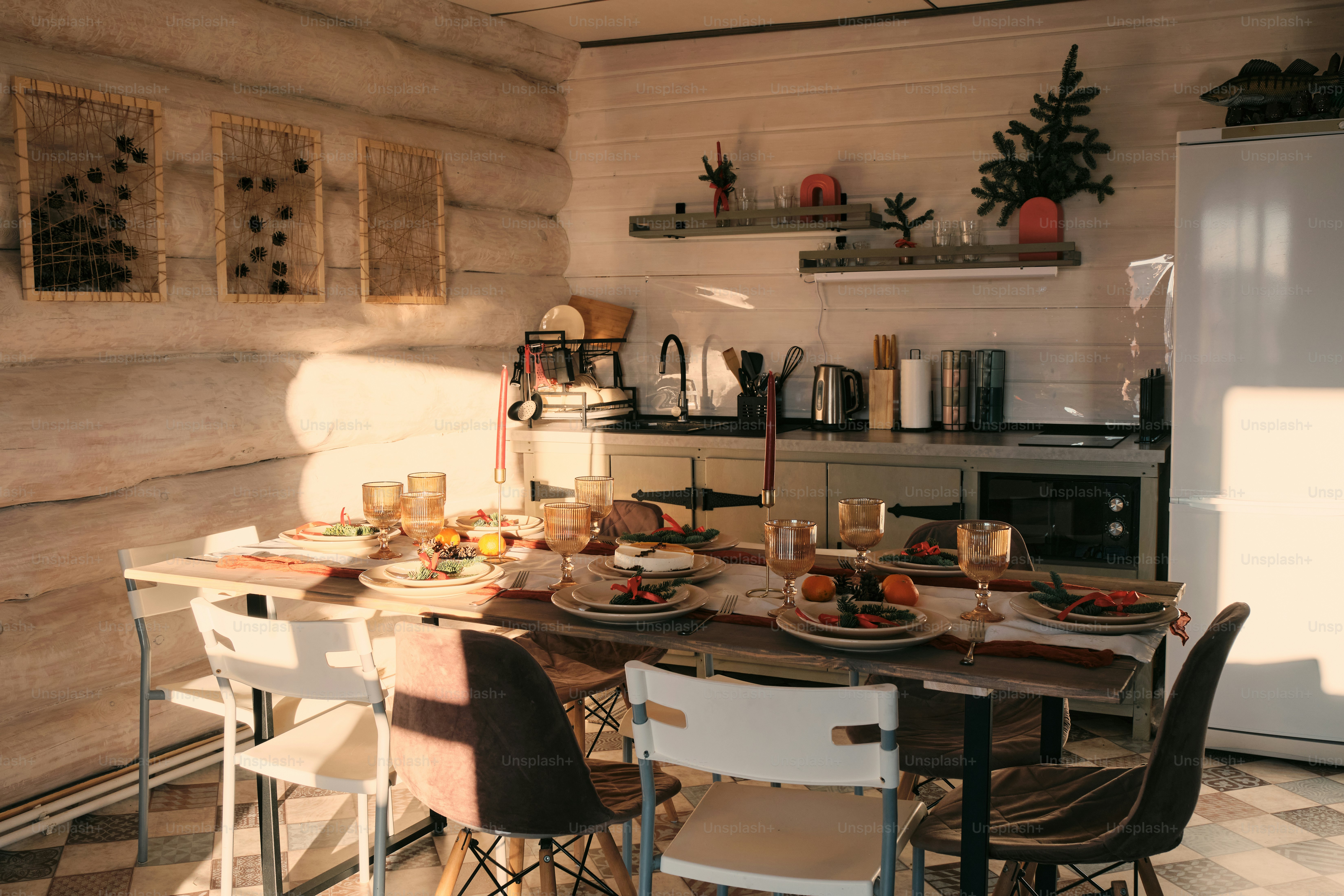 Cozy dining area with a table set for a meal. photo – Living room Image ...