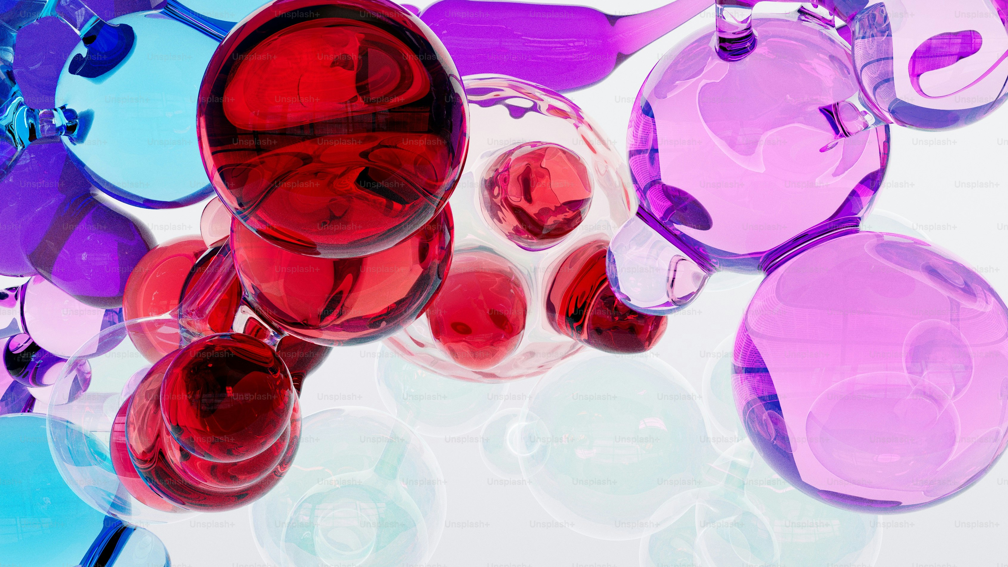Abstract colorful glass spheres on white background.