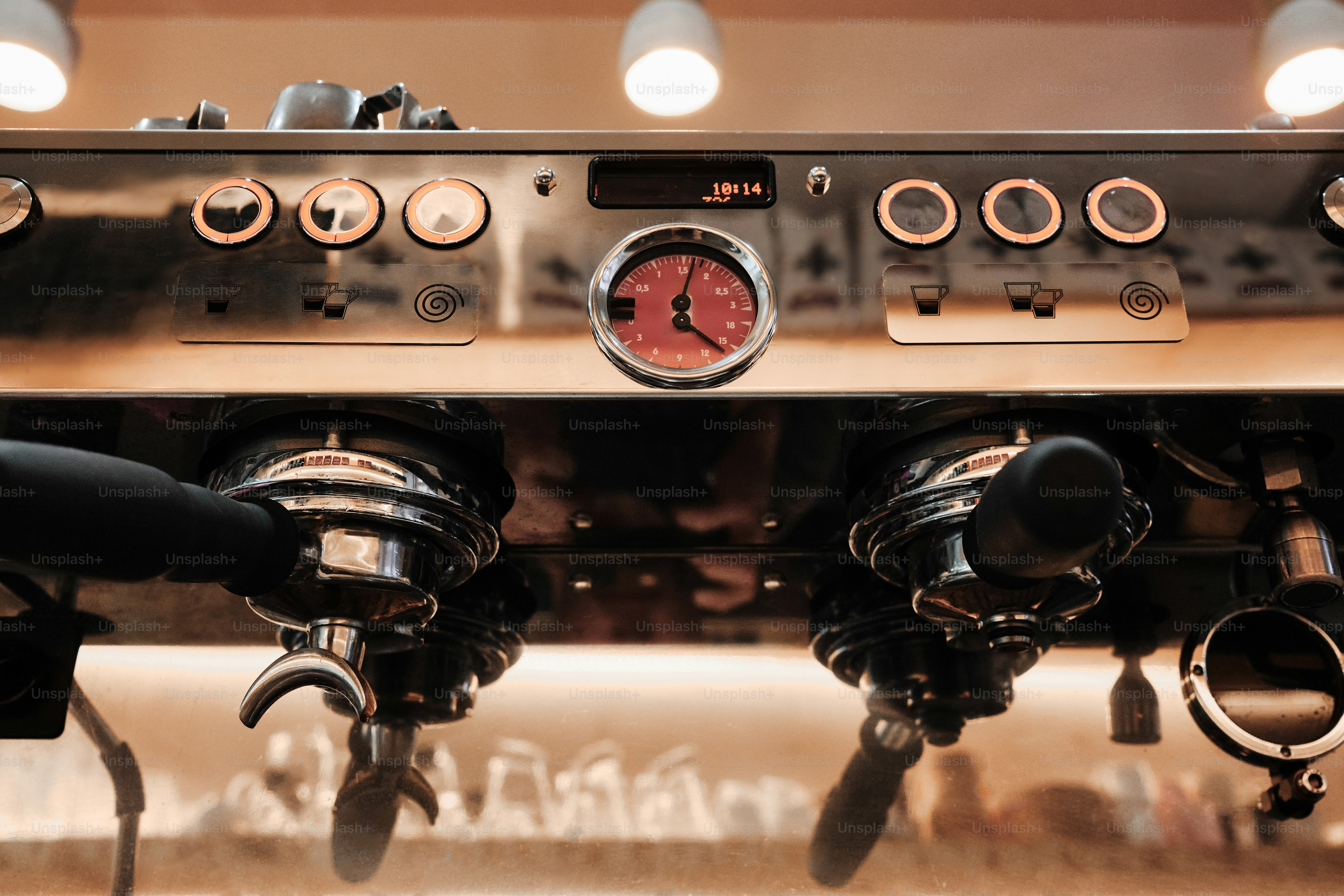 Close-up of a professional espresso machine with portafilters. photo ...