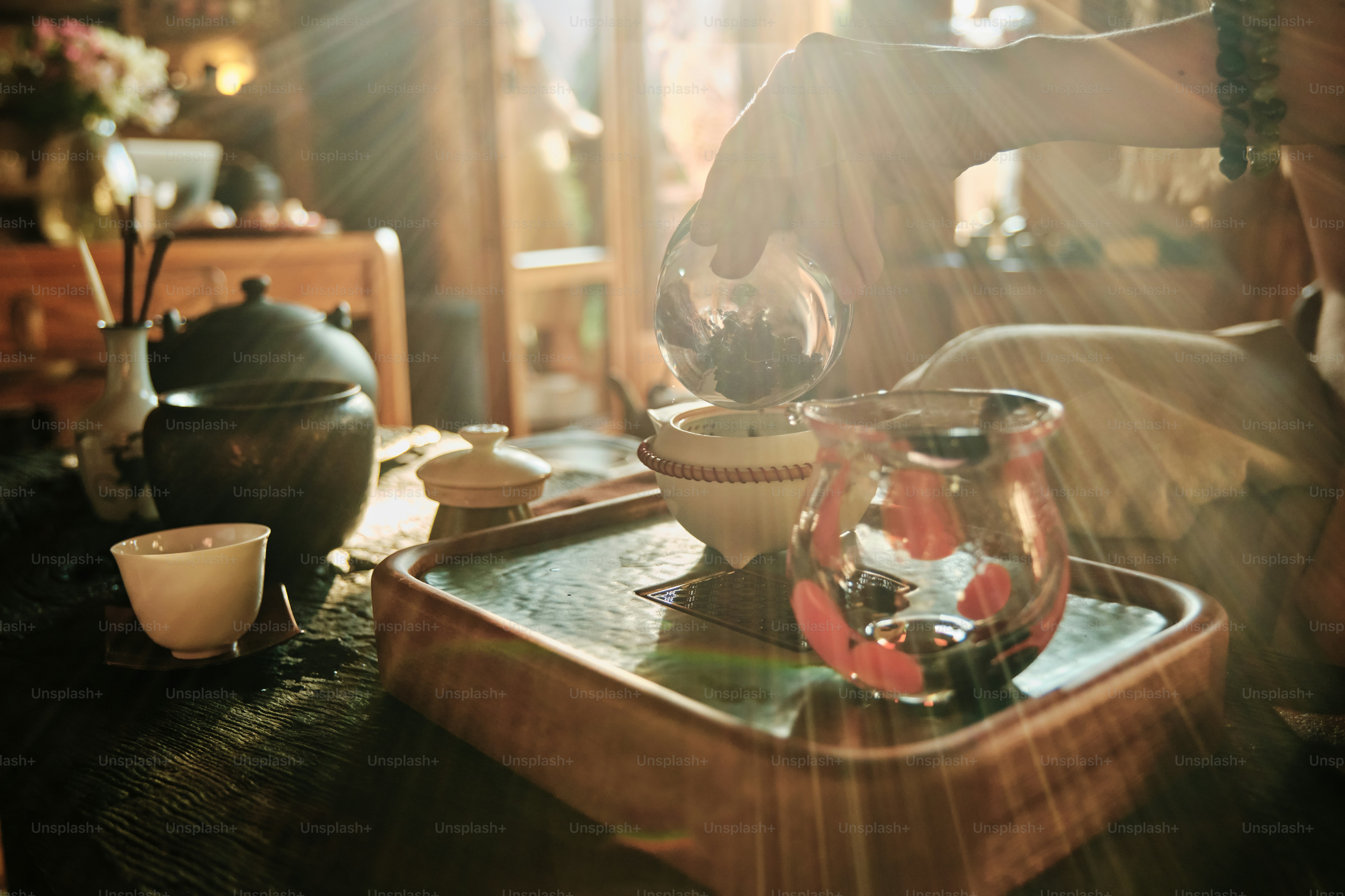 Tea ceremony preparation with traditional utensils.
